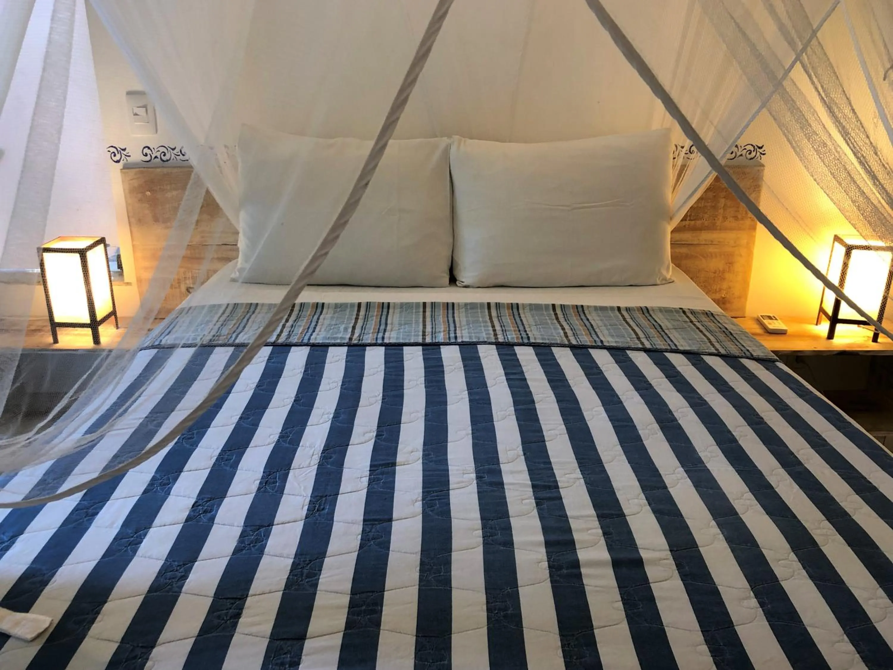 Bed in Ouro Sobre Azul Apart Hotel