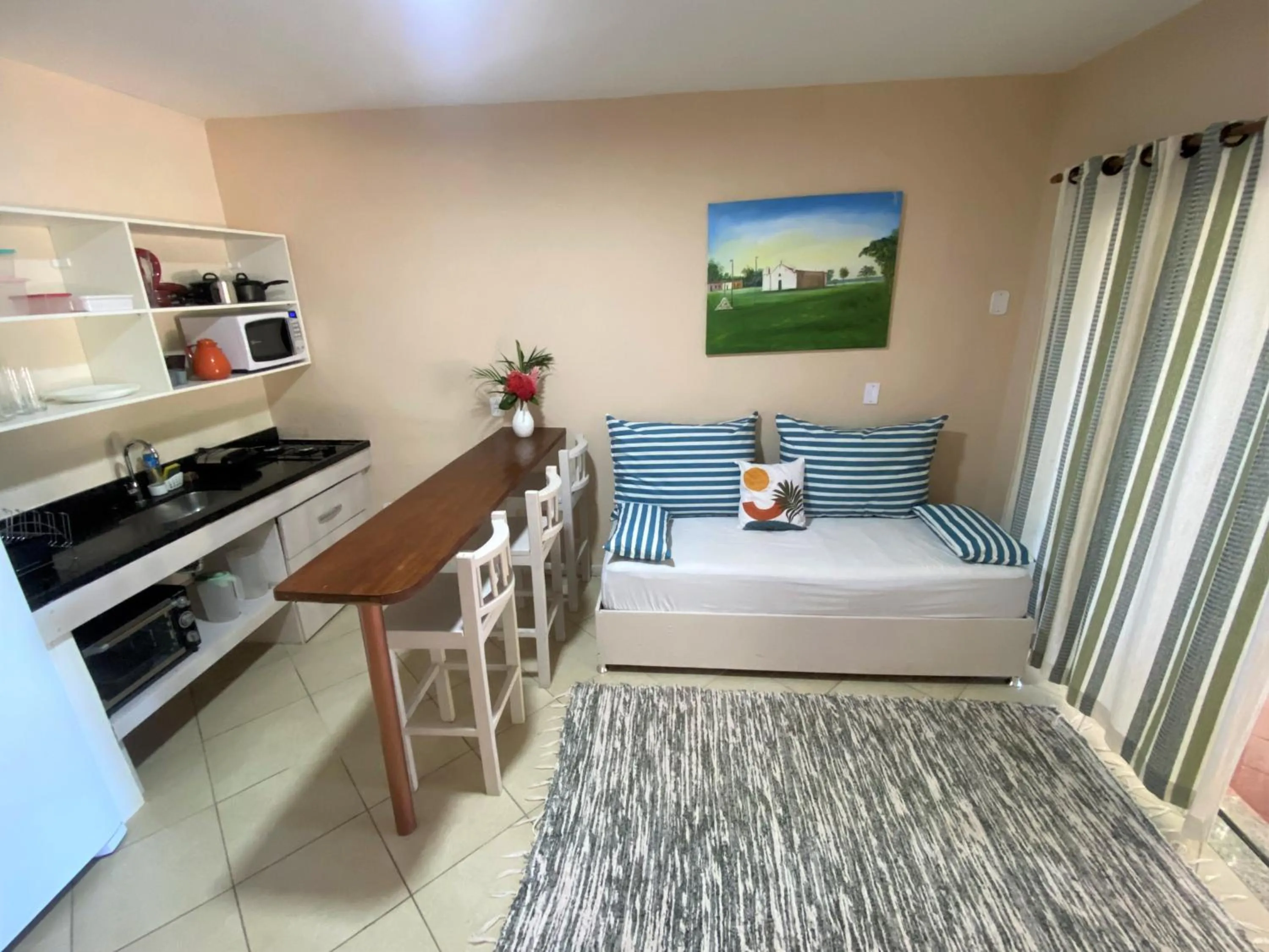 Bed in Ouro Sobre Azul Apart Hotel