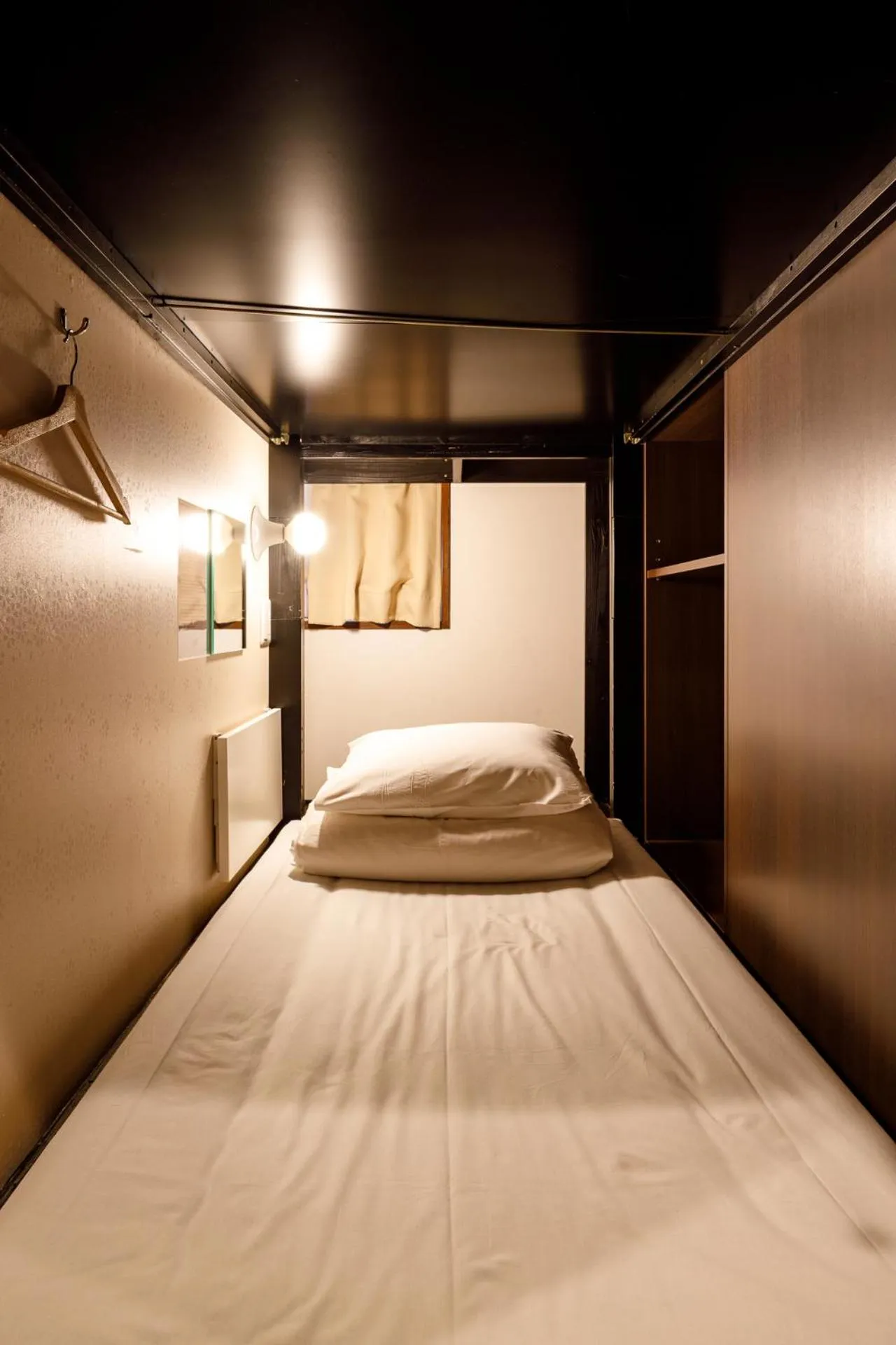 Bed in Hotel Owl Tokyo Nippori