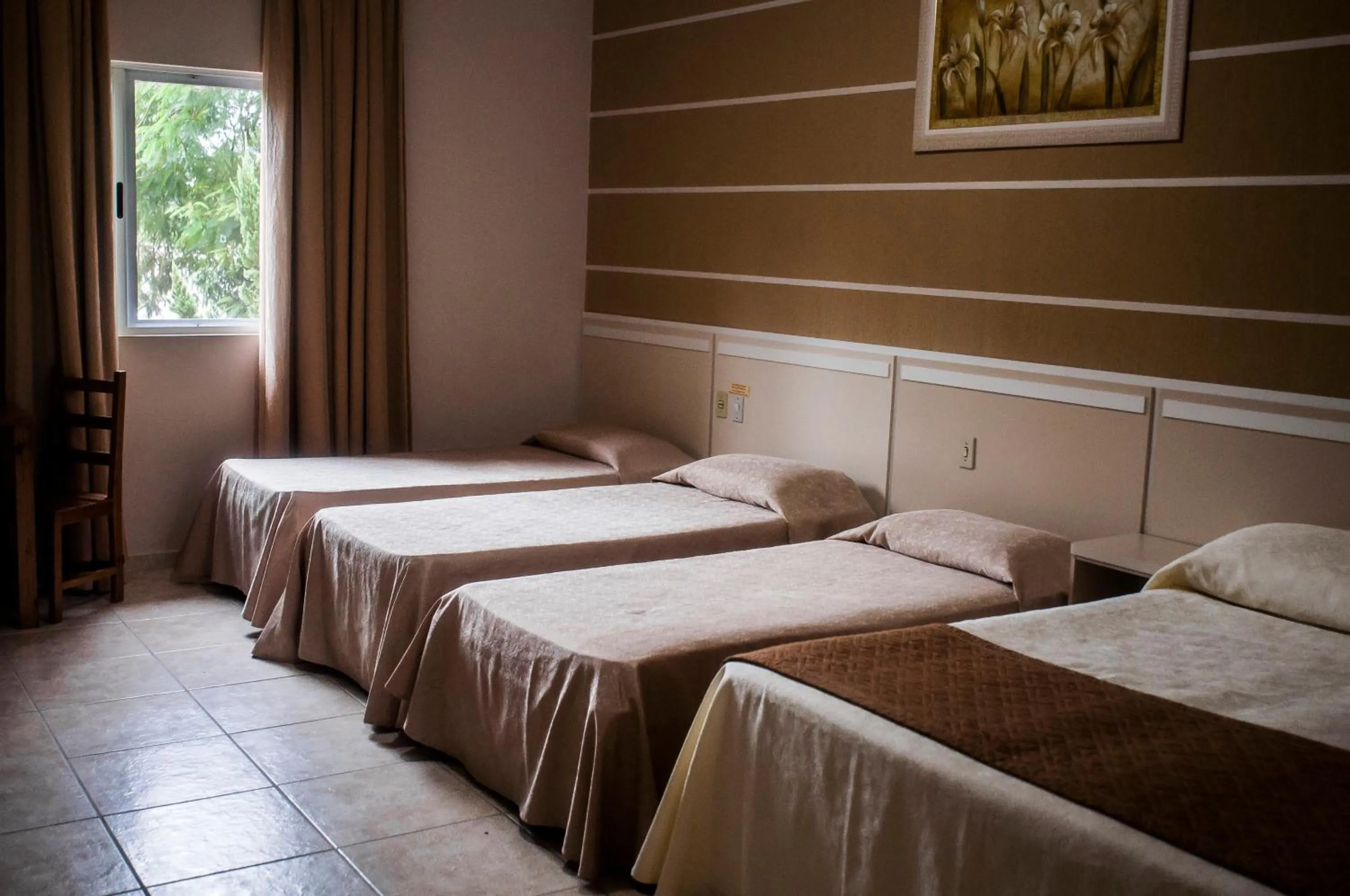 Bed in Pousada Cataratas