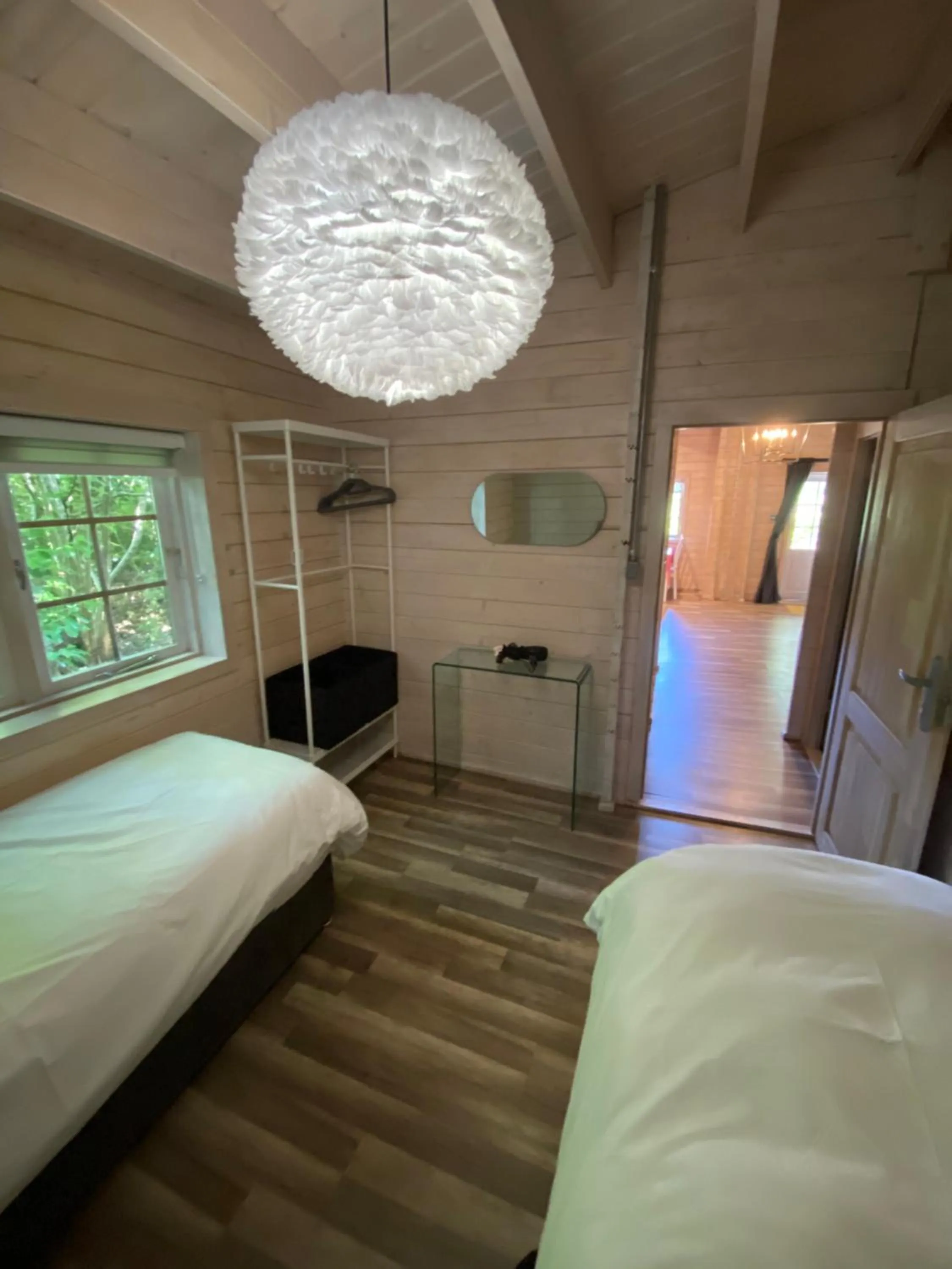 Bedroom in The Secret Cottage & Hideaway Caravan