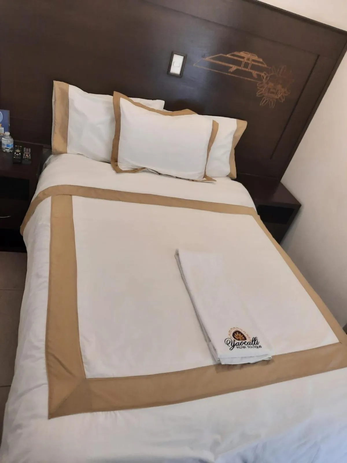 Bed in Hotel Boutique Yaocalli