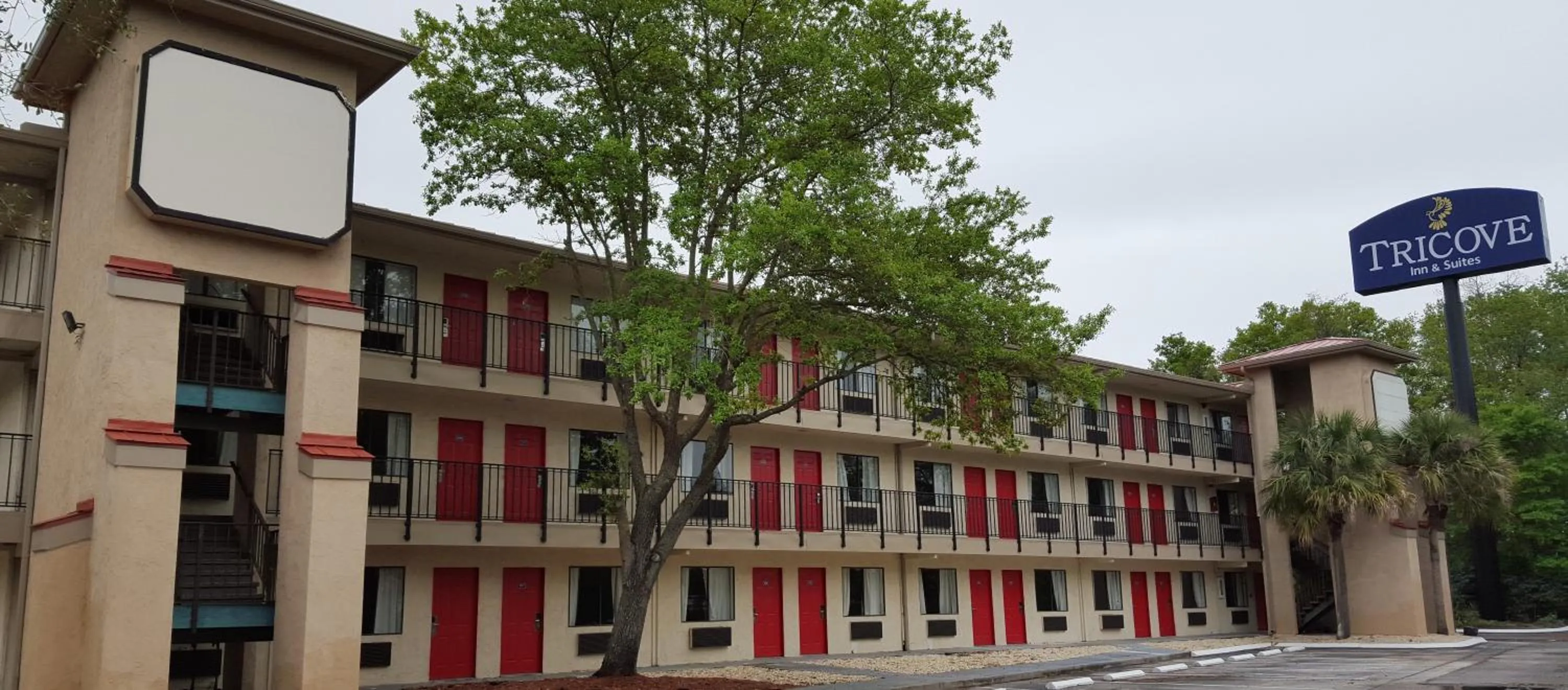 Property building in Tricove Inn & Suites