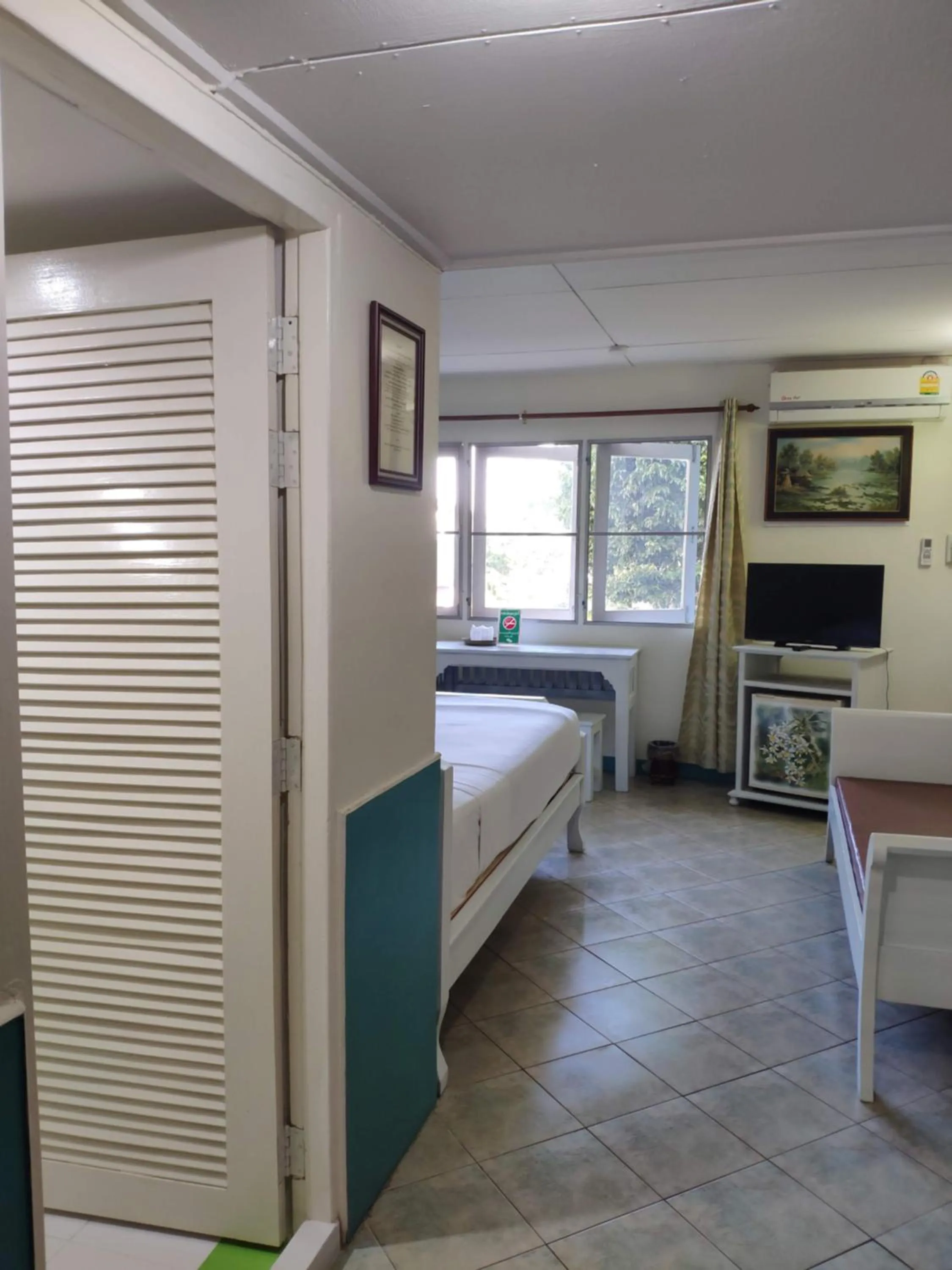 Bed in Changpuak Hotel