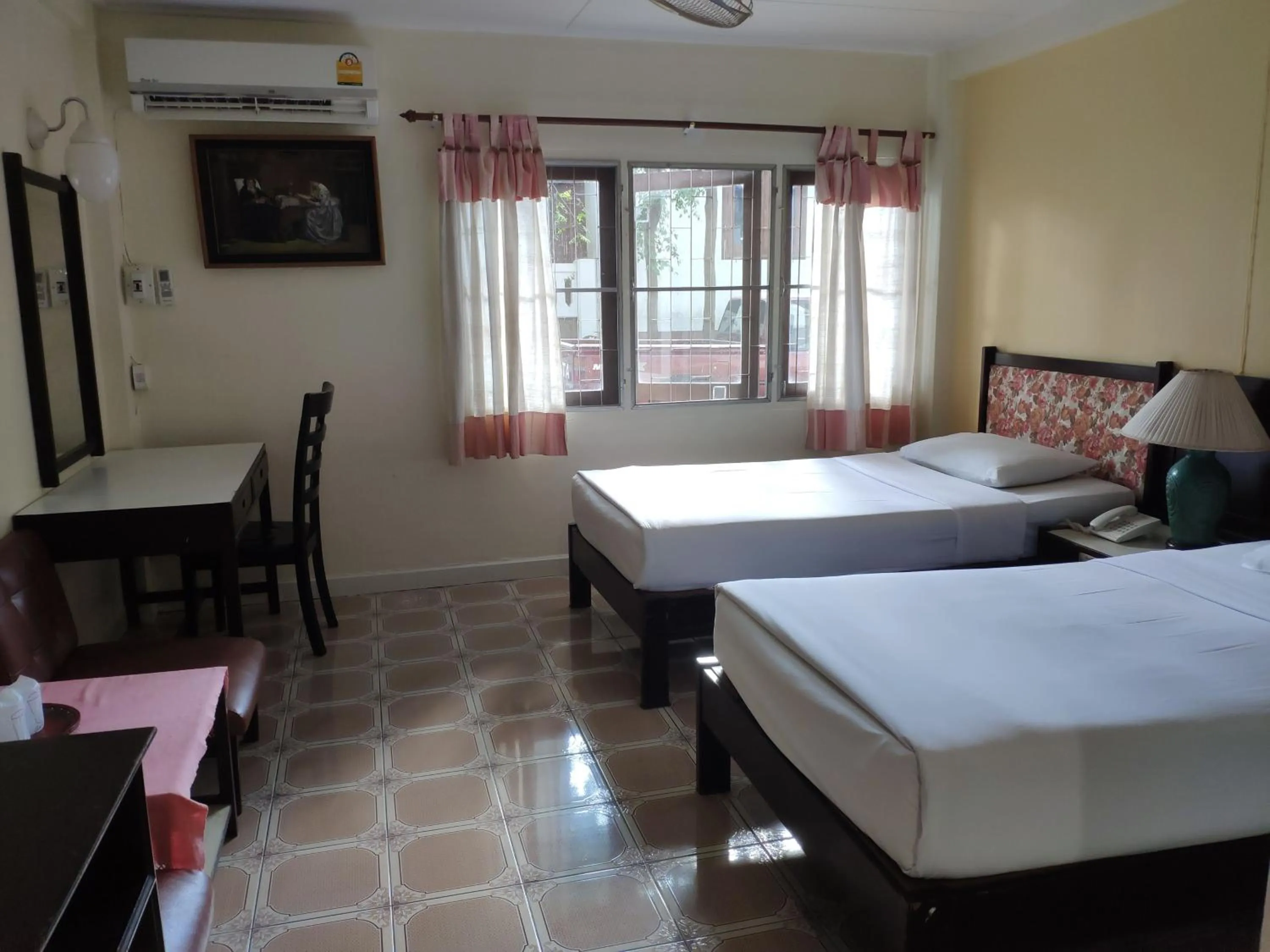 Bed in Changpuak Hotel