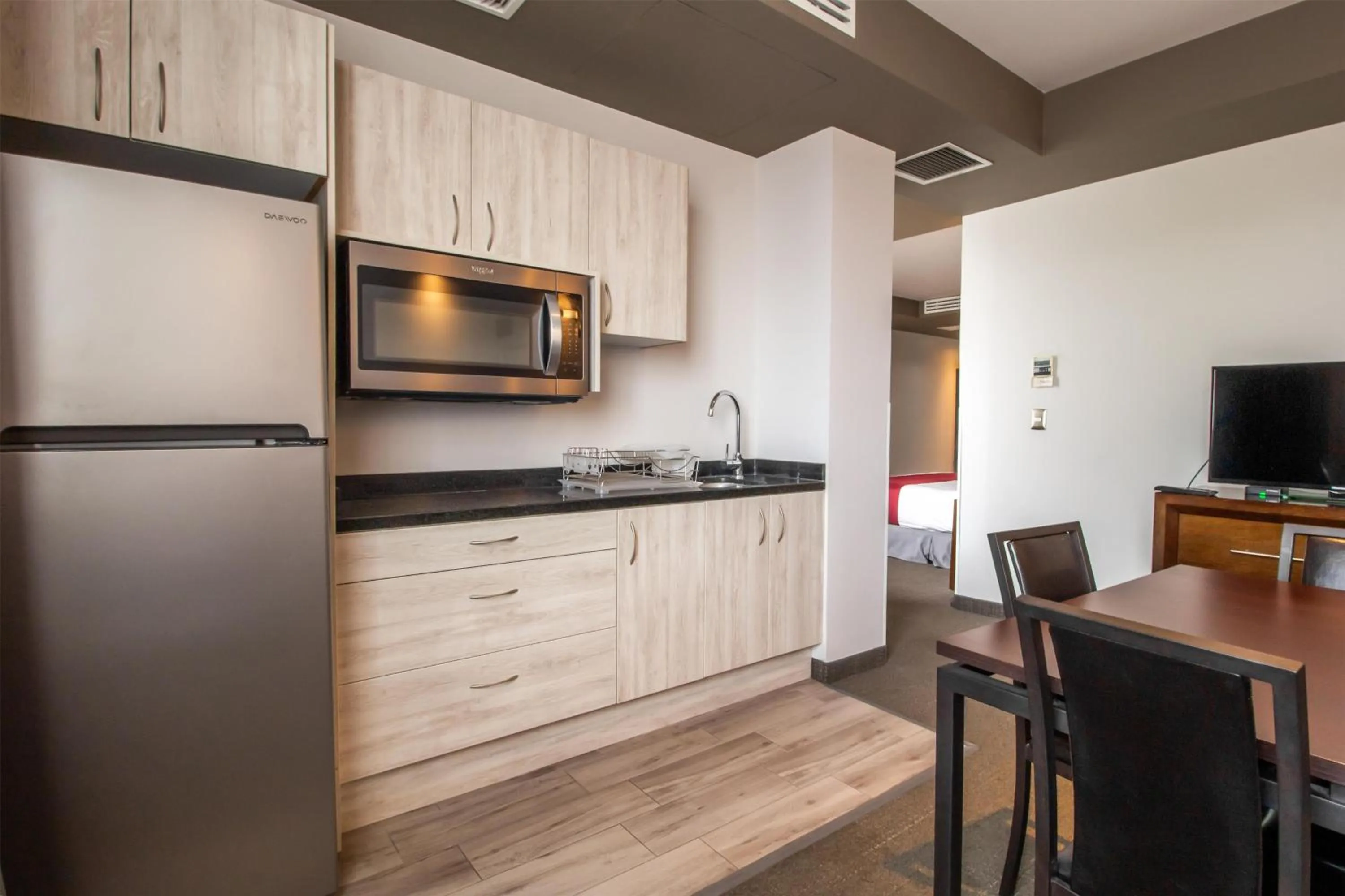 Kitchen or kitchenette in Best Western Plus Santa Cecilia Pachuca