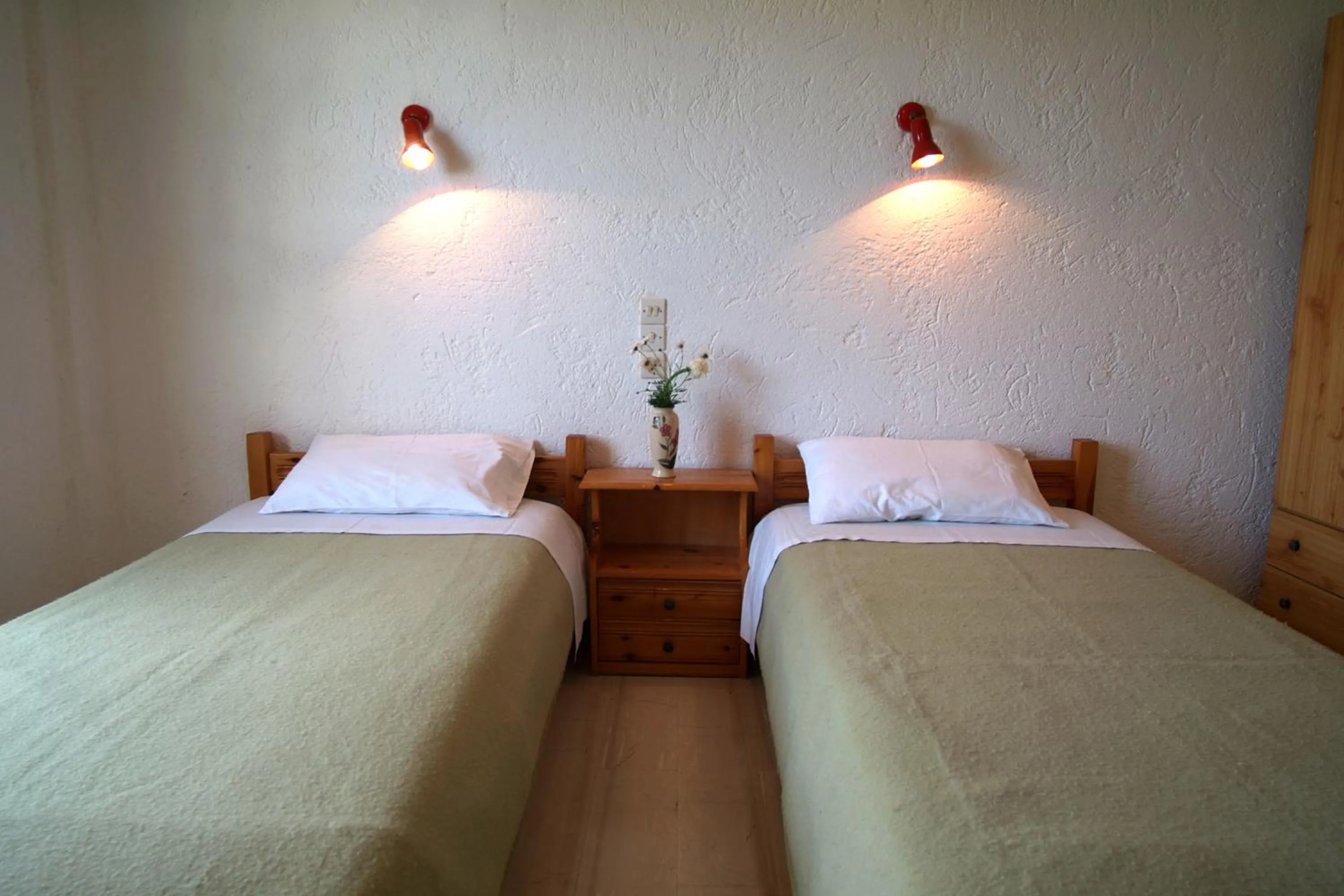 Bed in Prinos Apartments