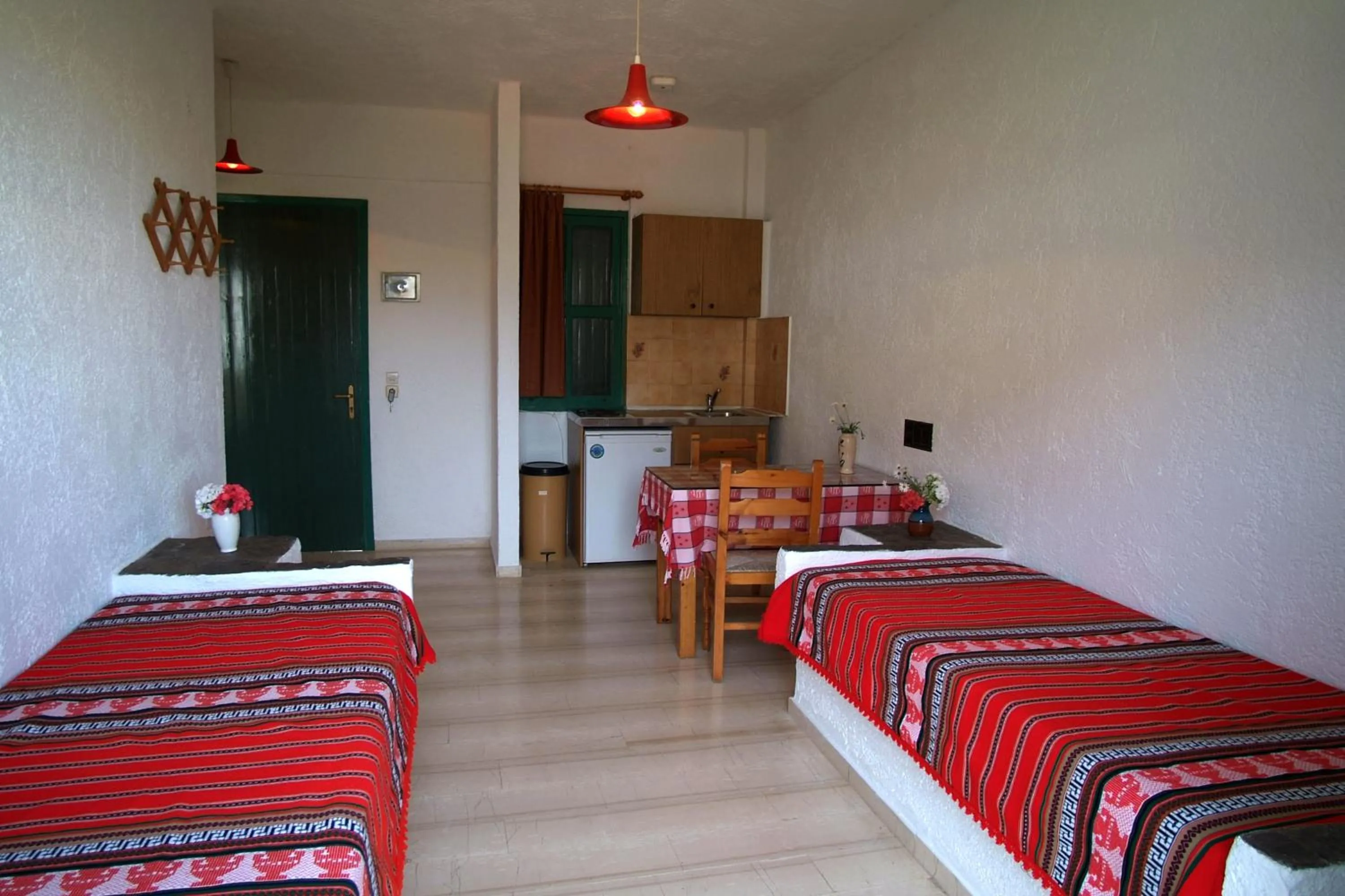 Bed in Prinos Apartments