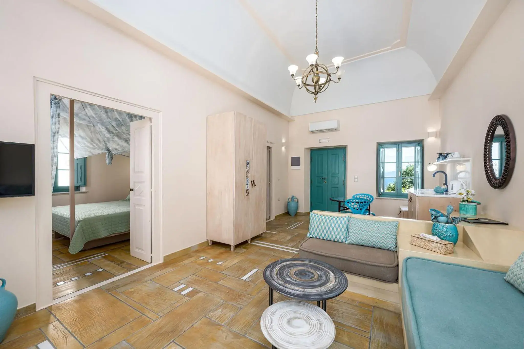 Communal lounge/ TV room, Bed in Passion Blue Villas Communal lounge/ TV room, Bed in Passion Blue Villas