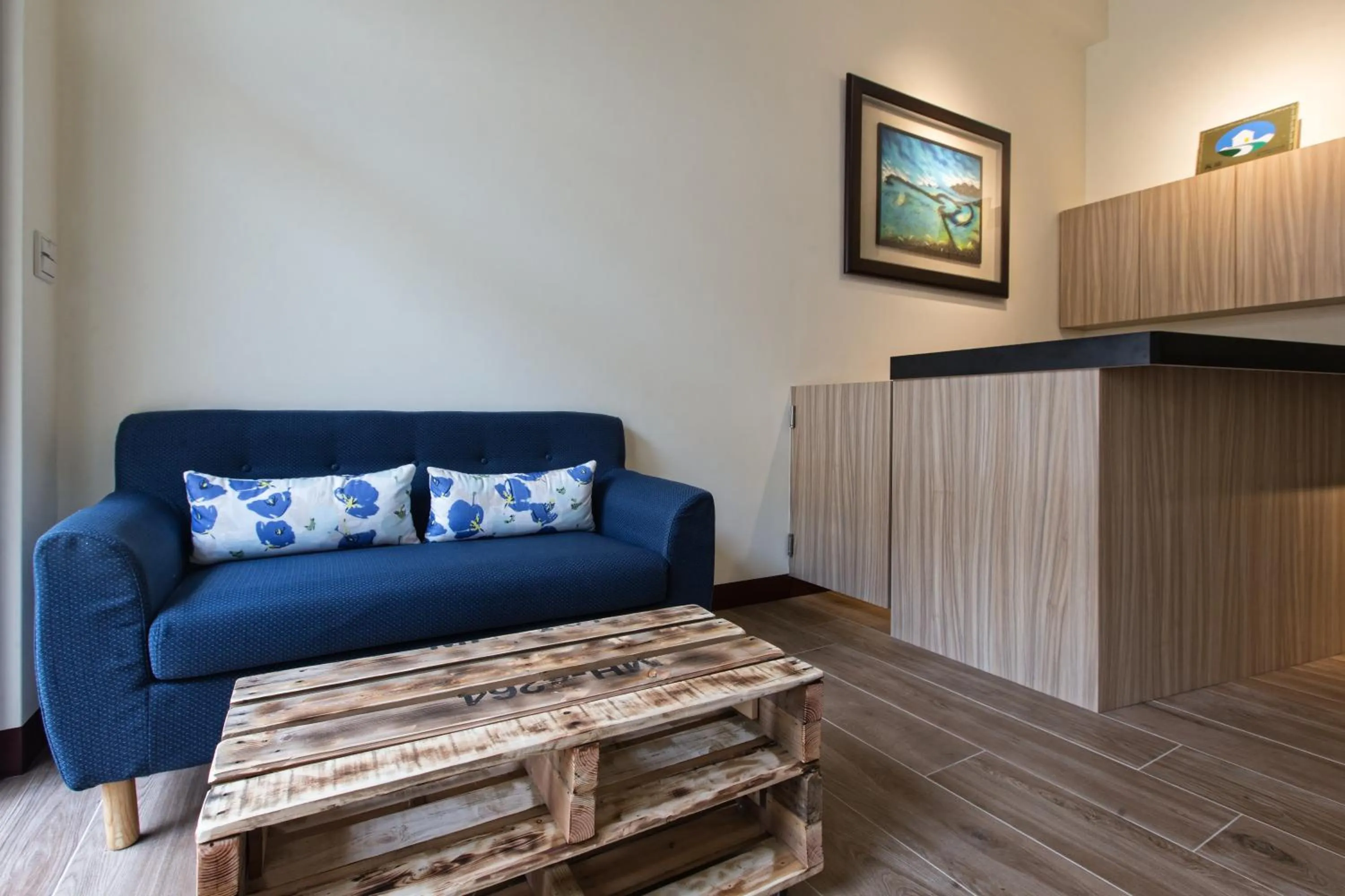 Communal lounge/ TV room in Sanwu Homestay