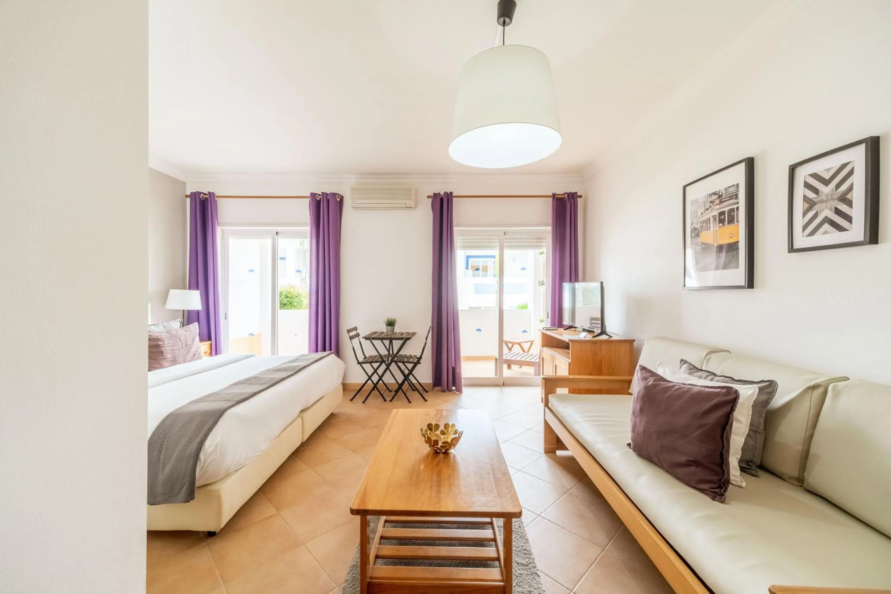 Bed in Oasis Beach Apartments