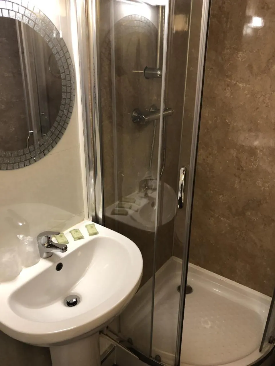 Bathroom in OYO The Bentleys Hotel