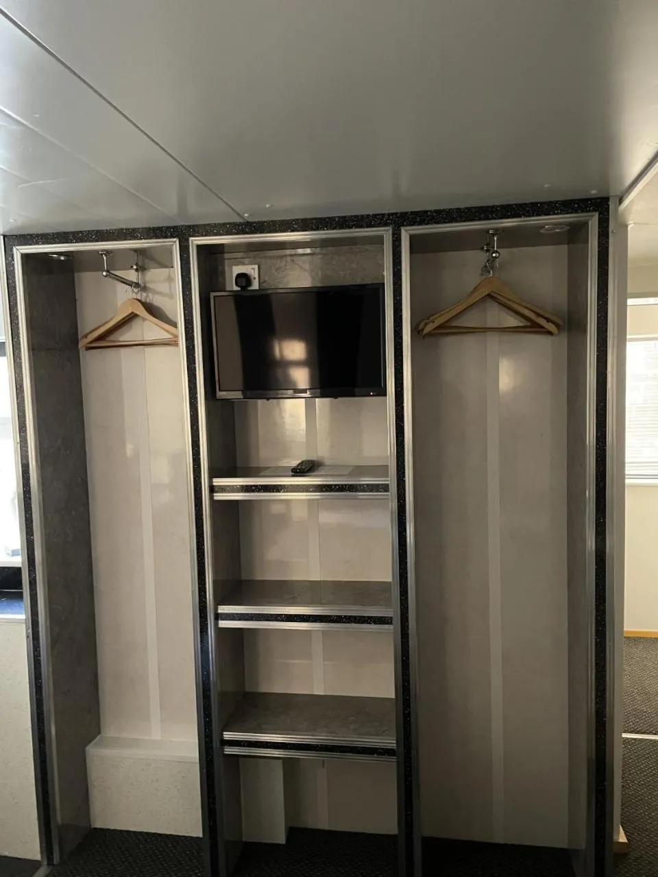 Bedroom in OYO The Bentleys Hotel