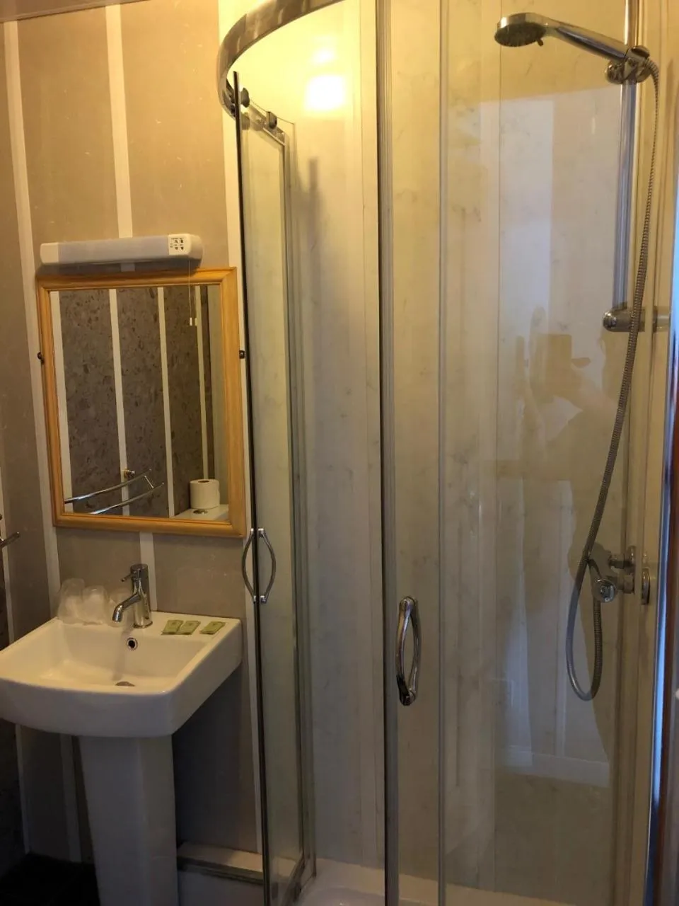 Bathroom in OYO The Bentleys Hotel