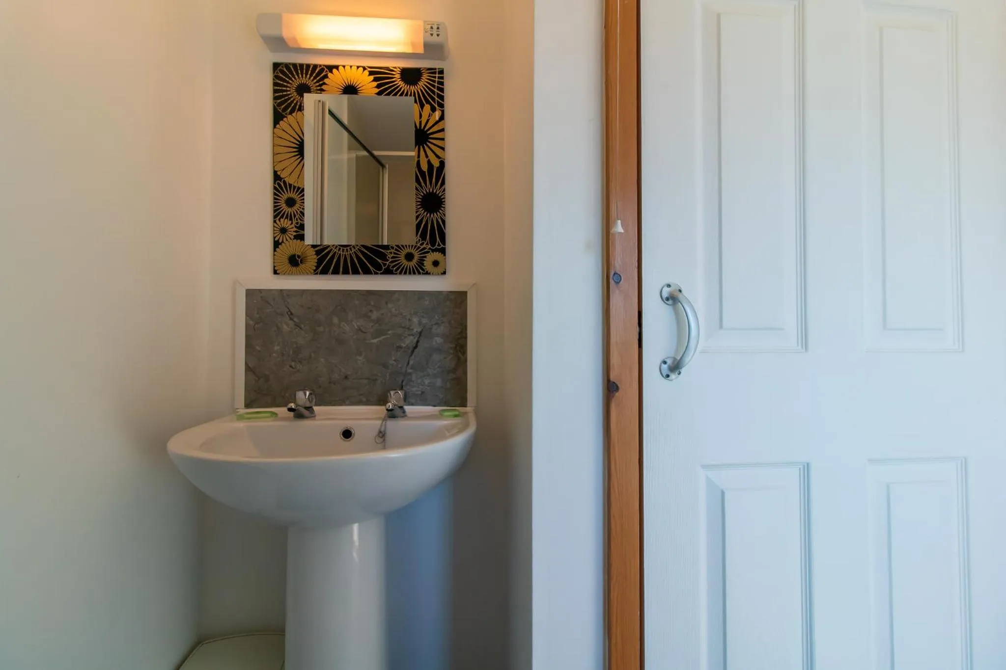 Bathroom in OYO The Bentleys Hotel