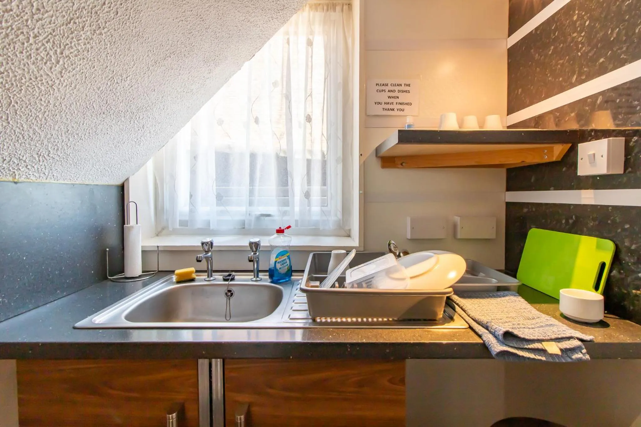 Kitchen or kitchenette in OYO The Bentleys Hotel