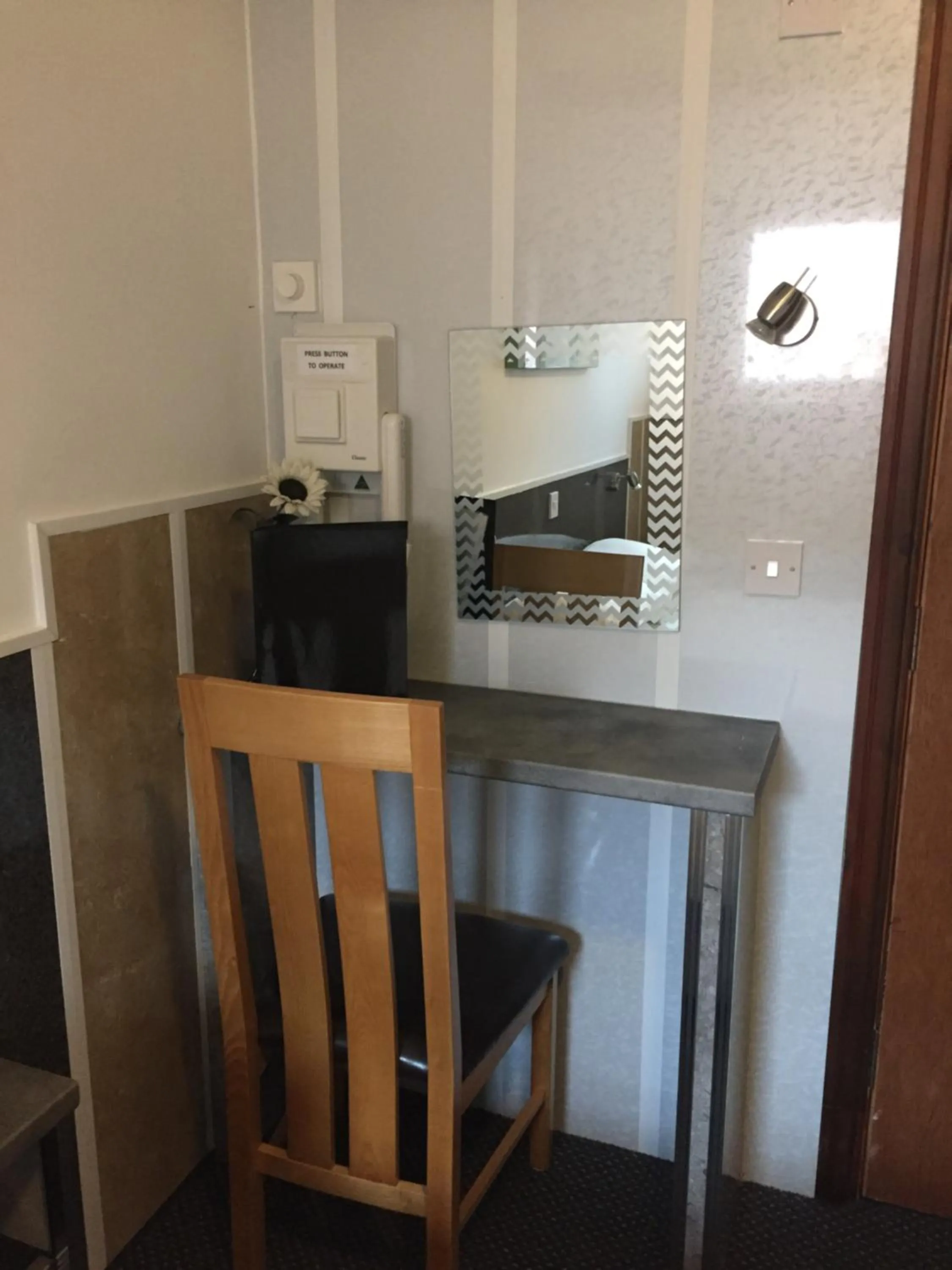 Bedroom in OYO The Bentleys Hotel