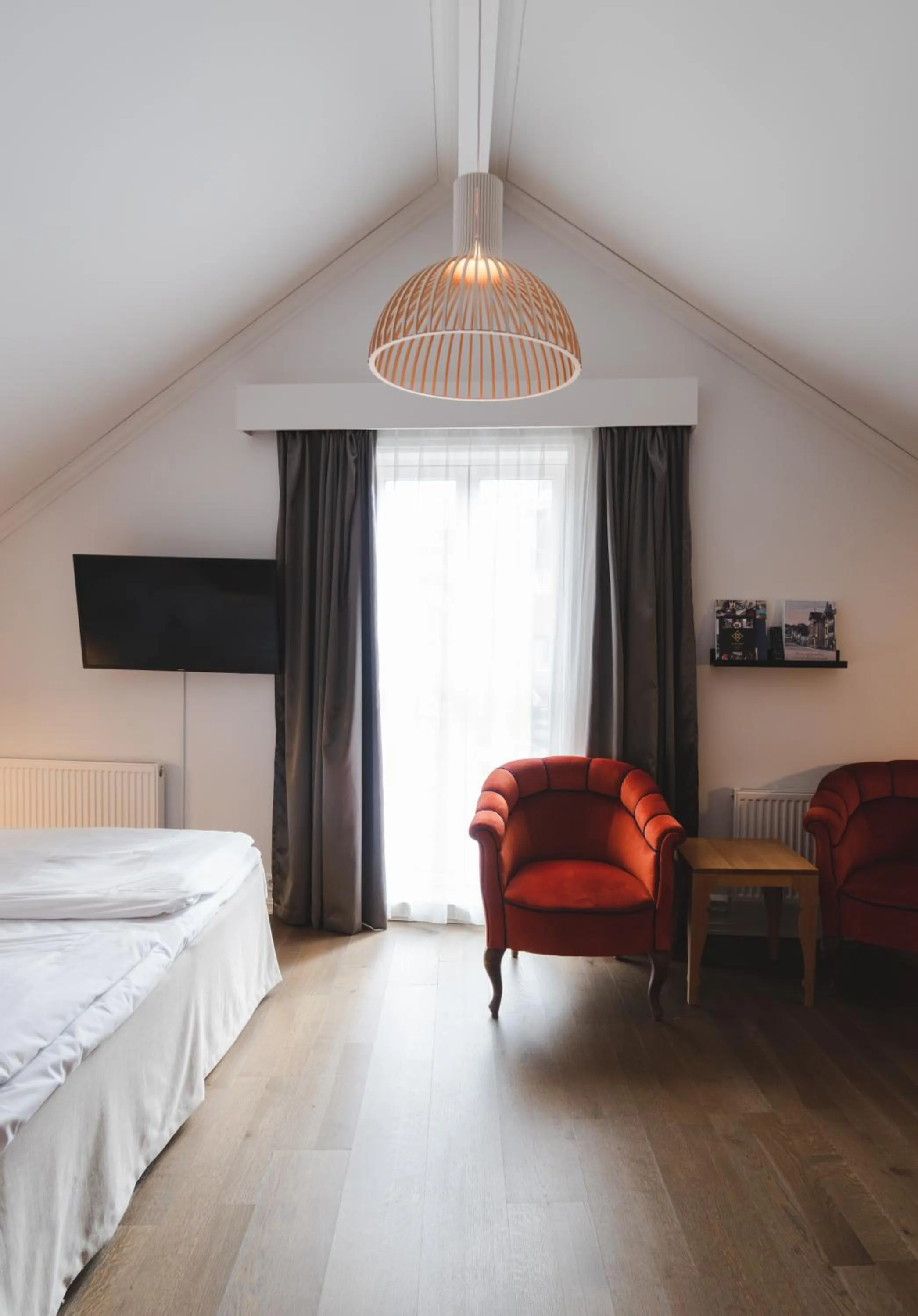 Seating area, Bed in Grand Hotel Egersund