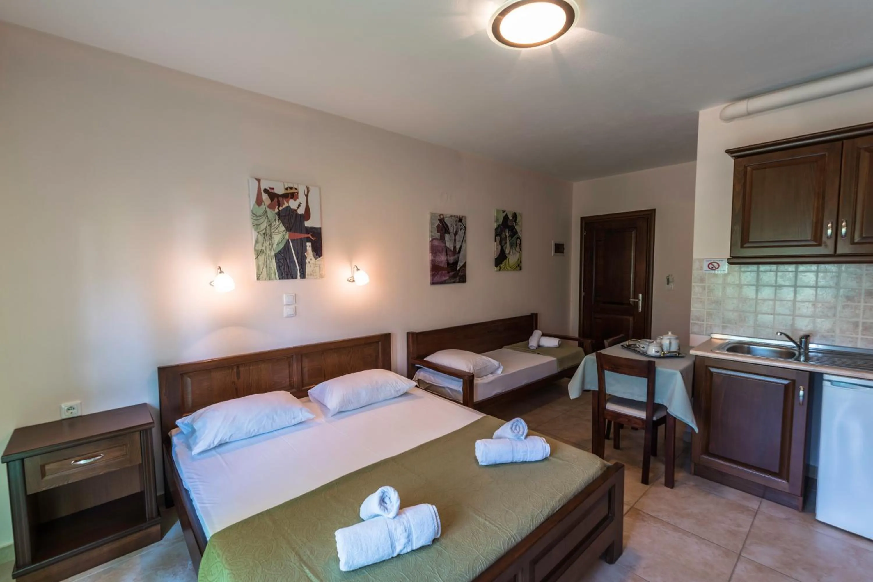 Bed in Zeus Apartments