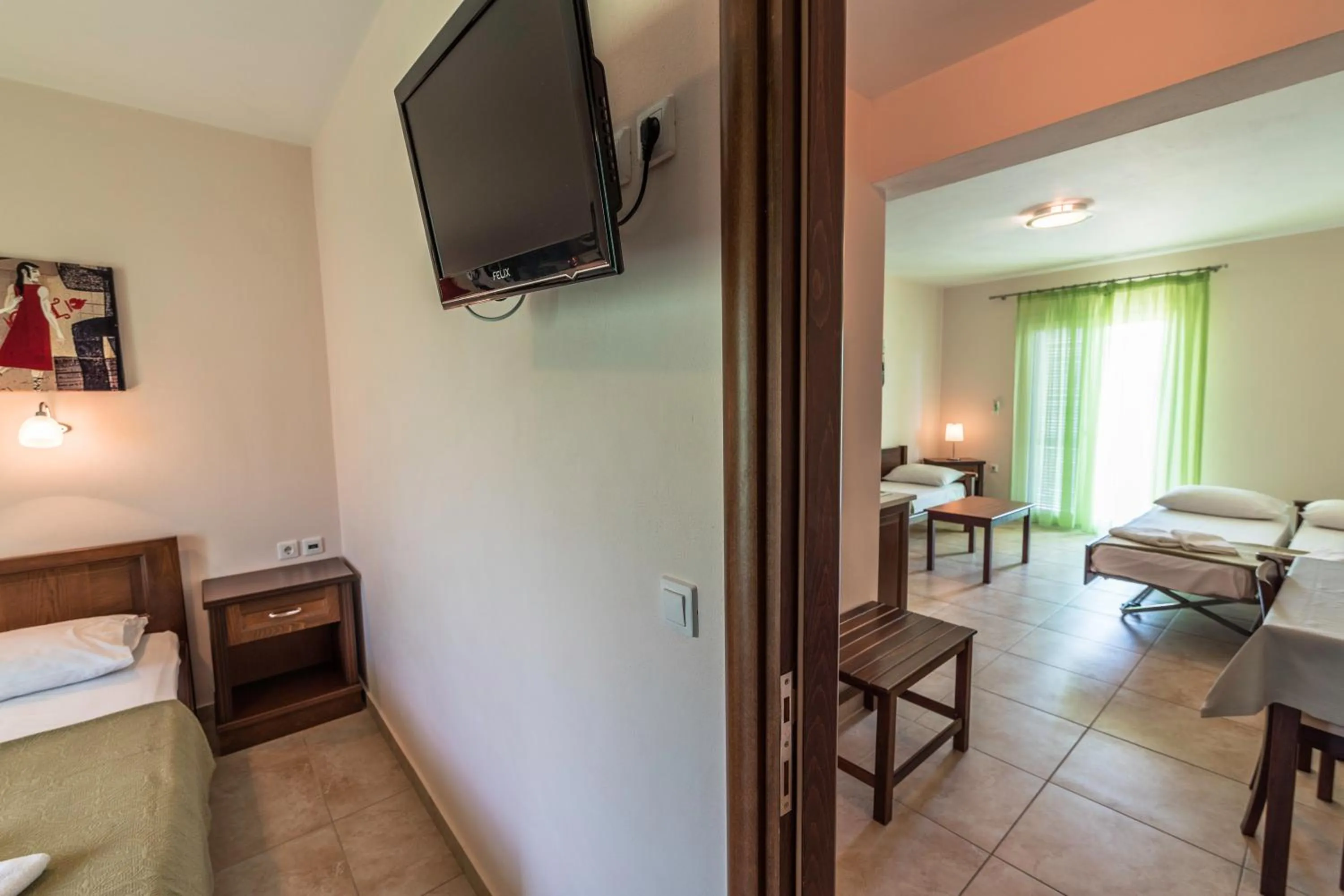 Bed in Zeus Apartments