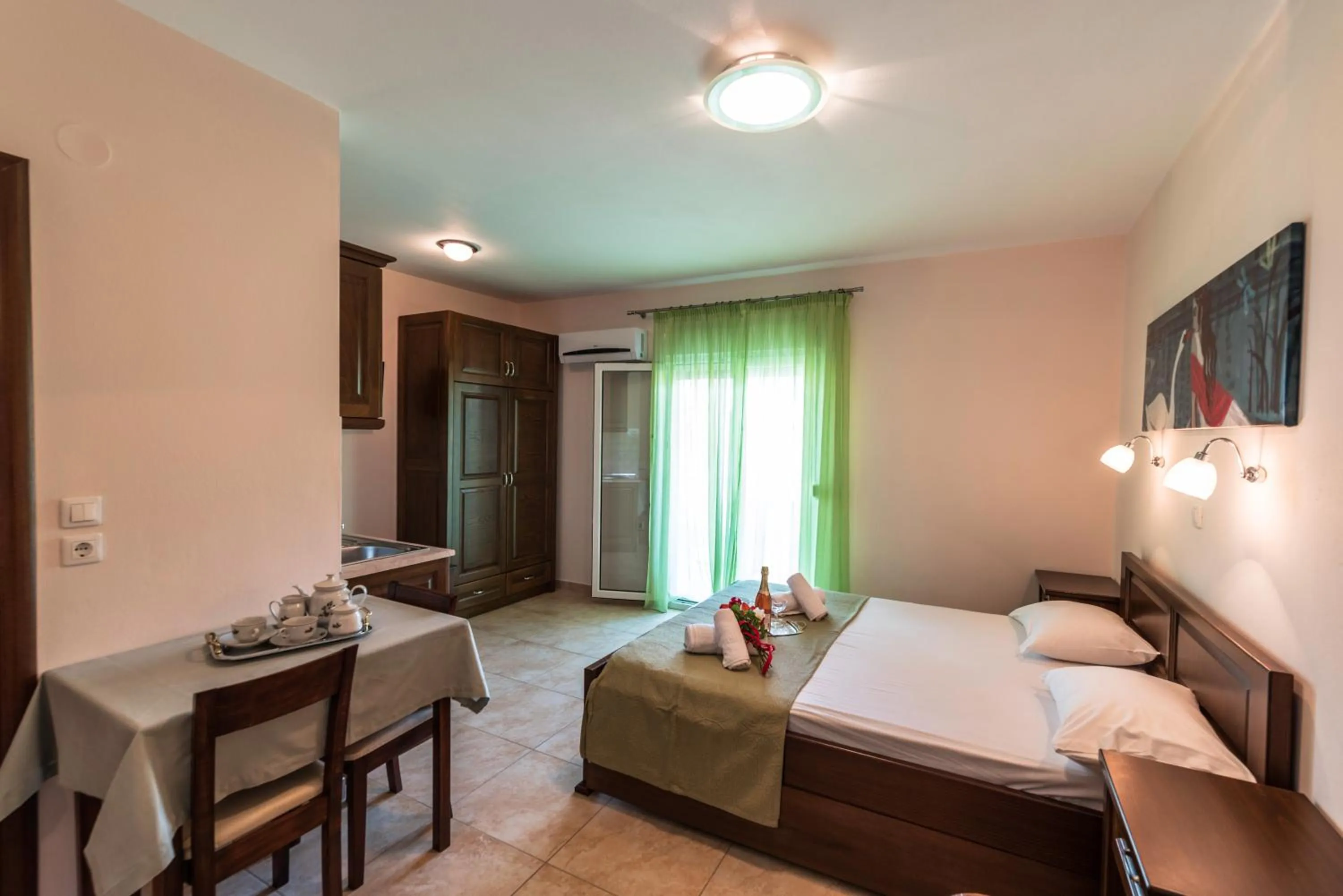 Bed in Zeus Apartments