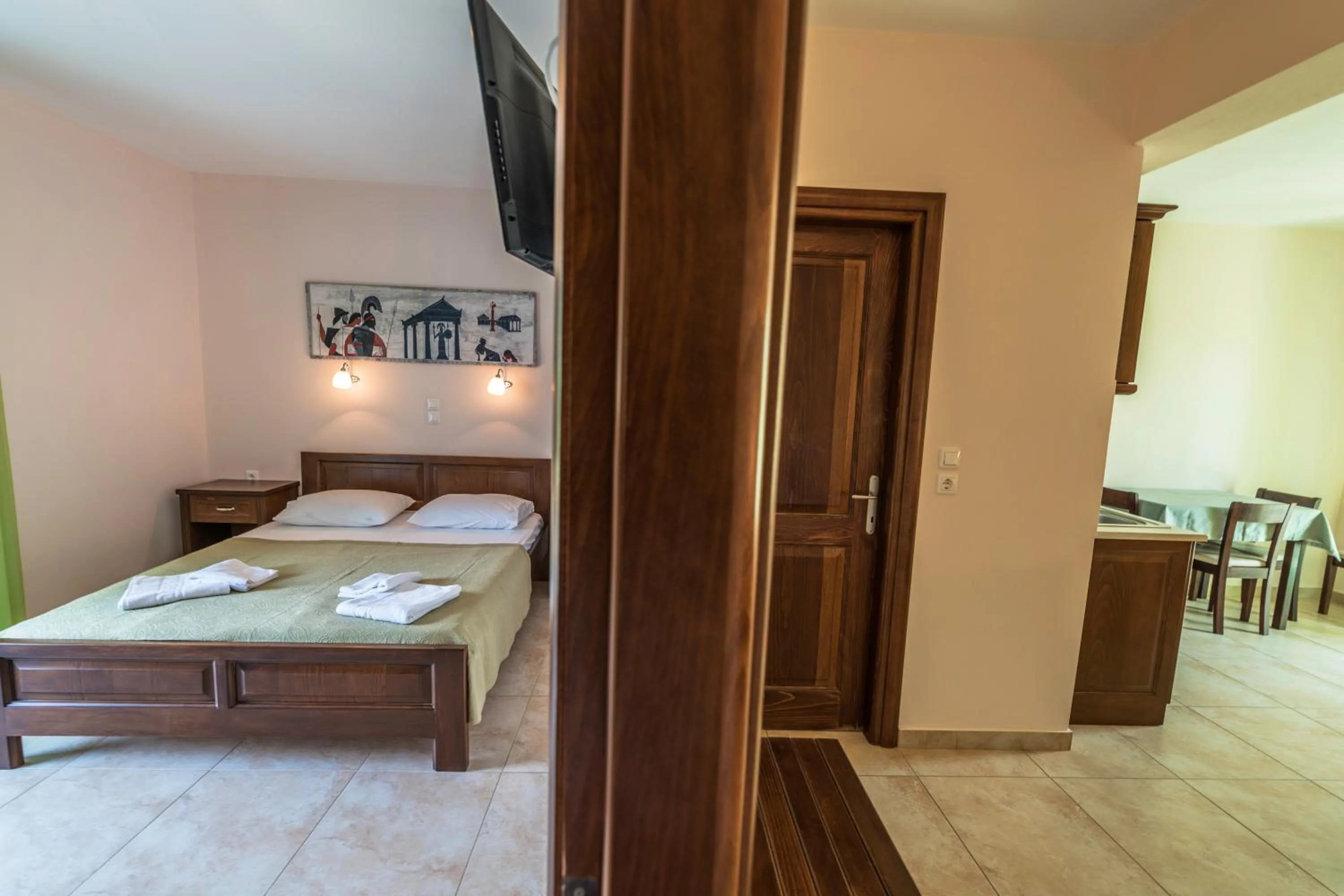 Bed in Zeus Apartments