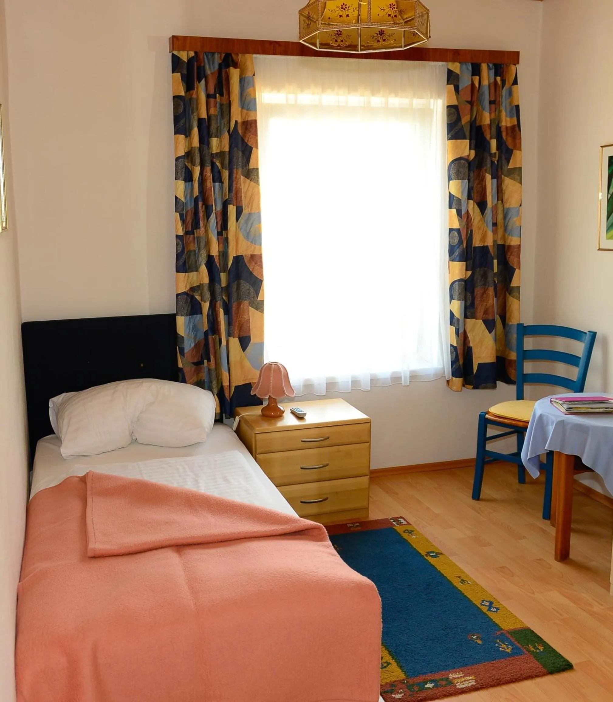 Bedroom in Strandhotel Pichler