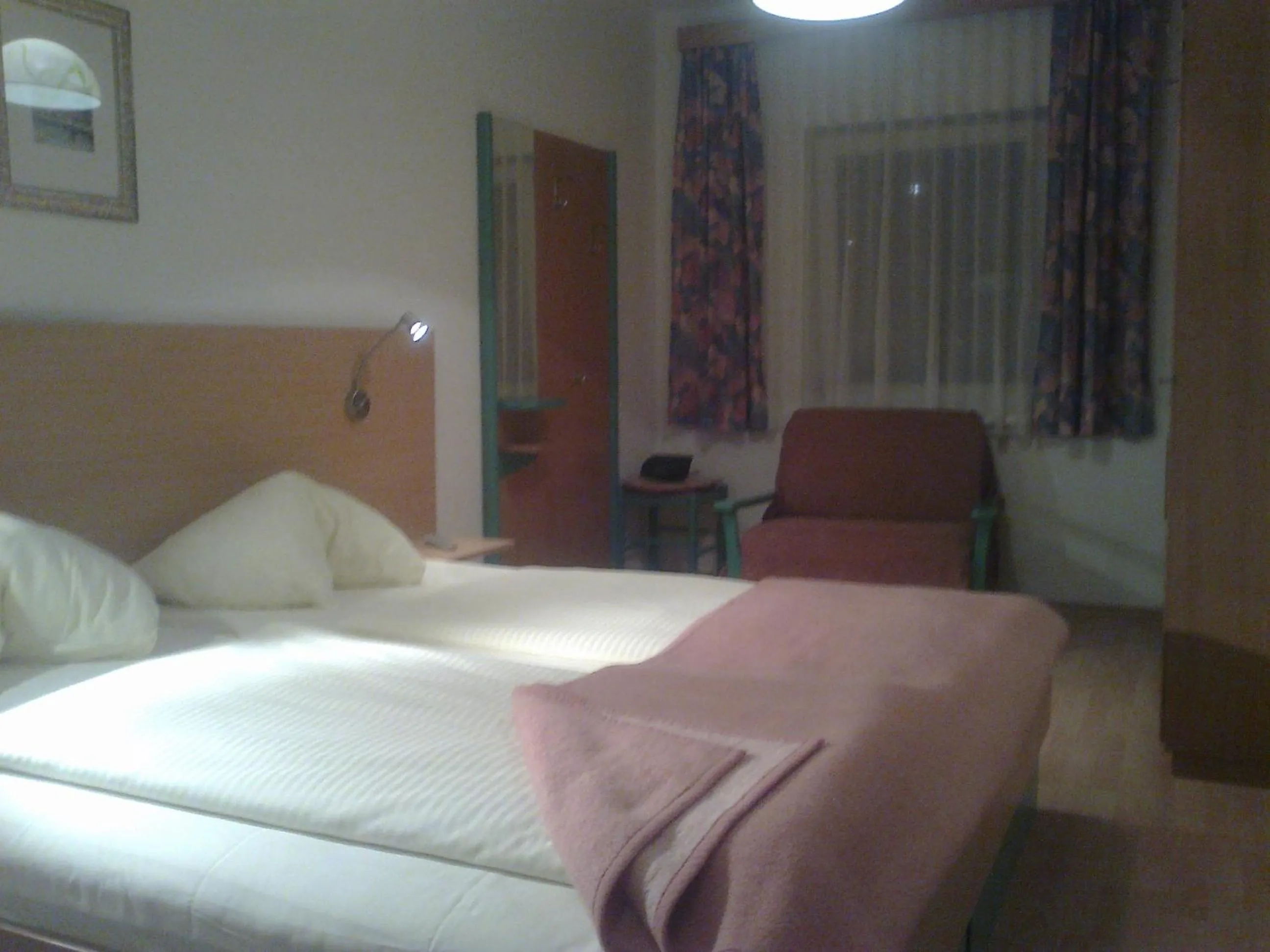 Bed in Strandhotel Pichler