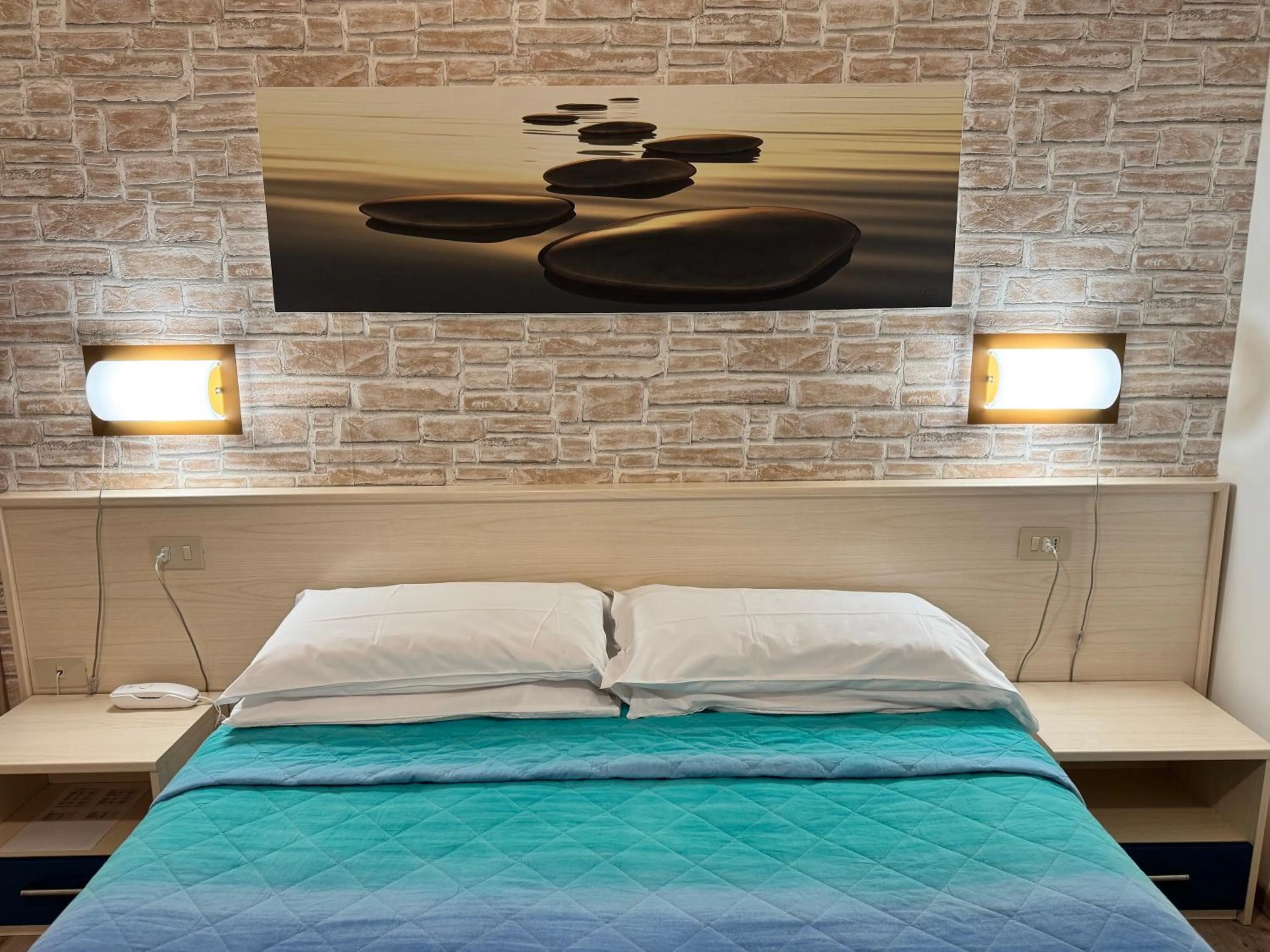 Bed in Regina Urban Beach Hotel