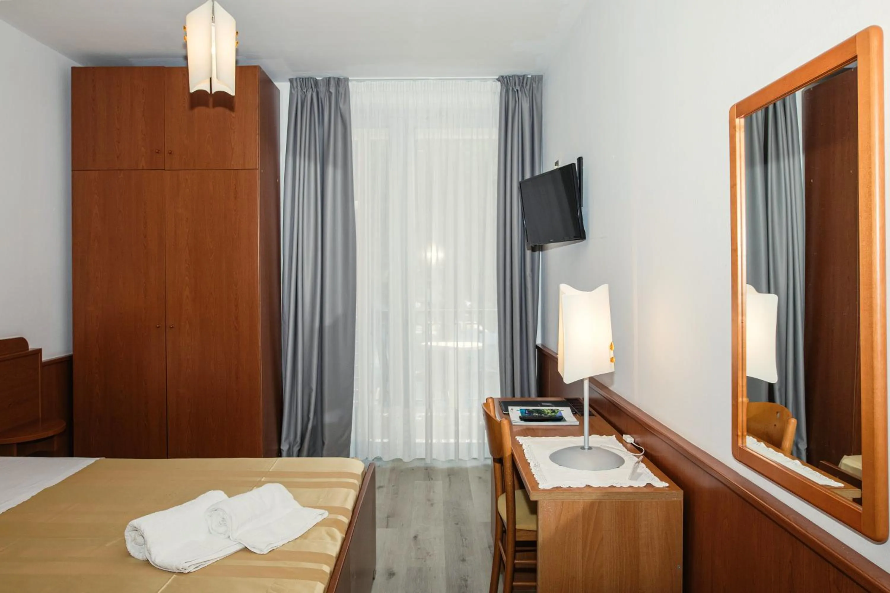 Bed in Hotel Leonardo Da Vinci Wellness SPA