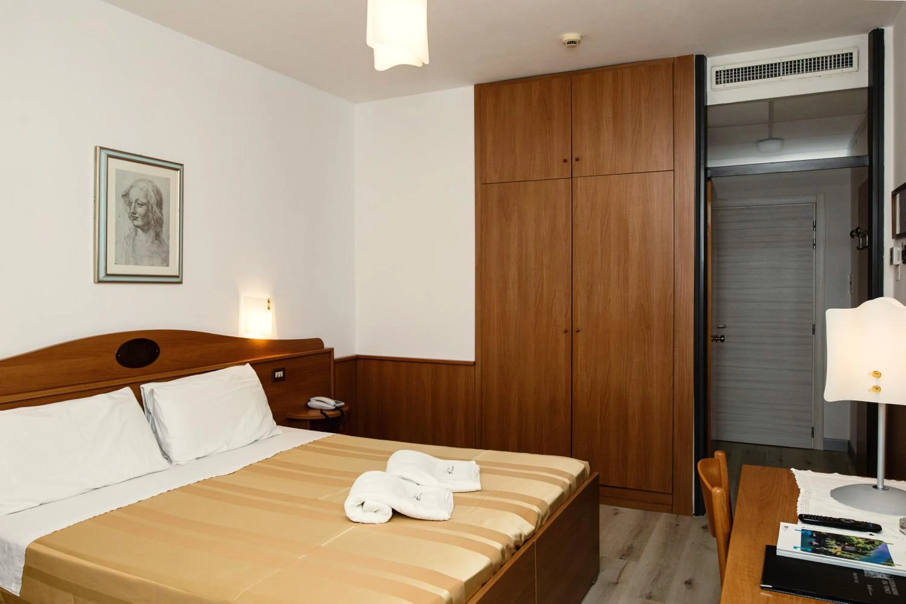 Bed in Hotel Leonardo Da Vinci Wellness SPA