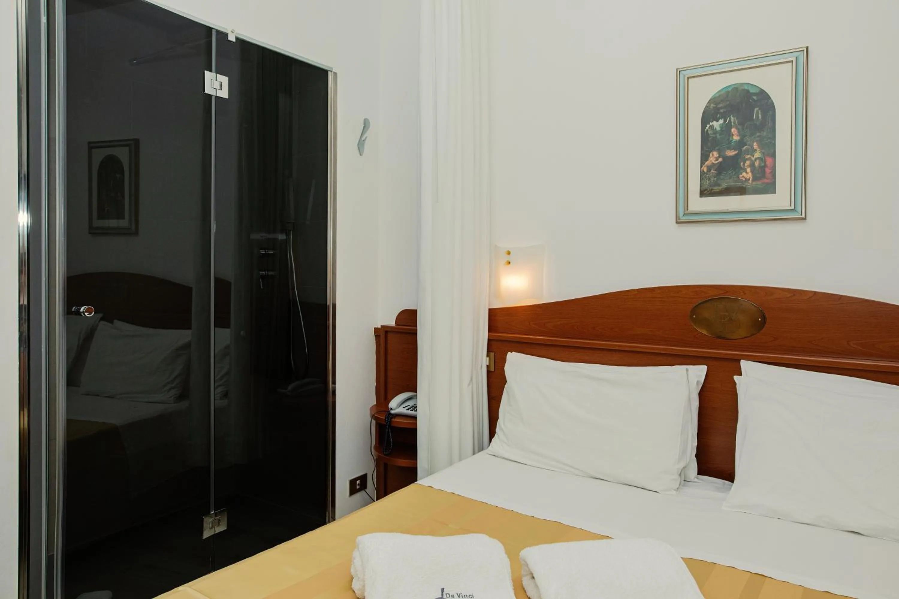 Bed in Hotel Leonardo Da Vinci Wellness SPA