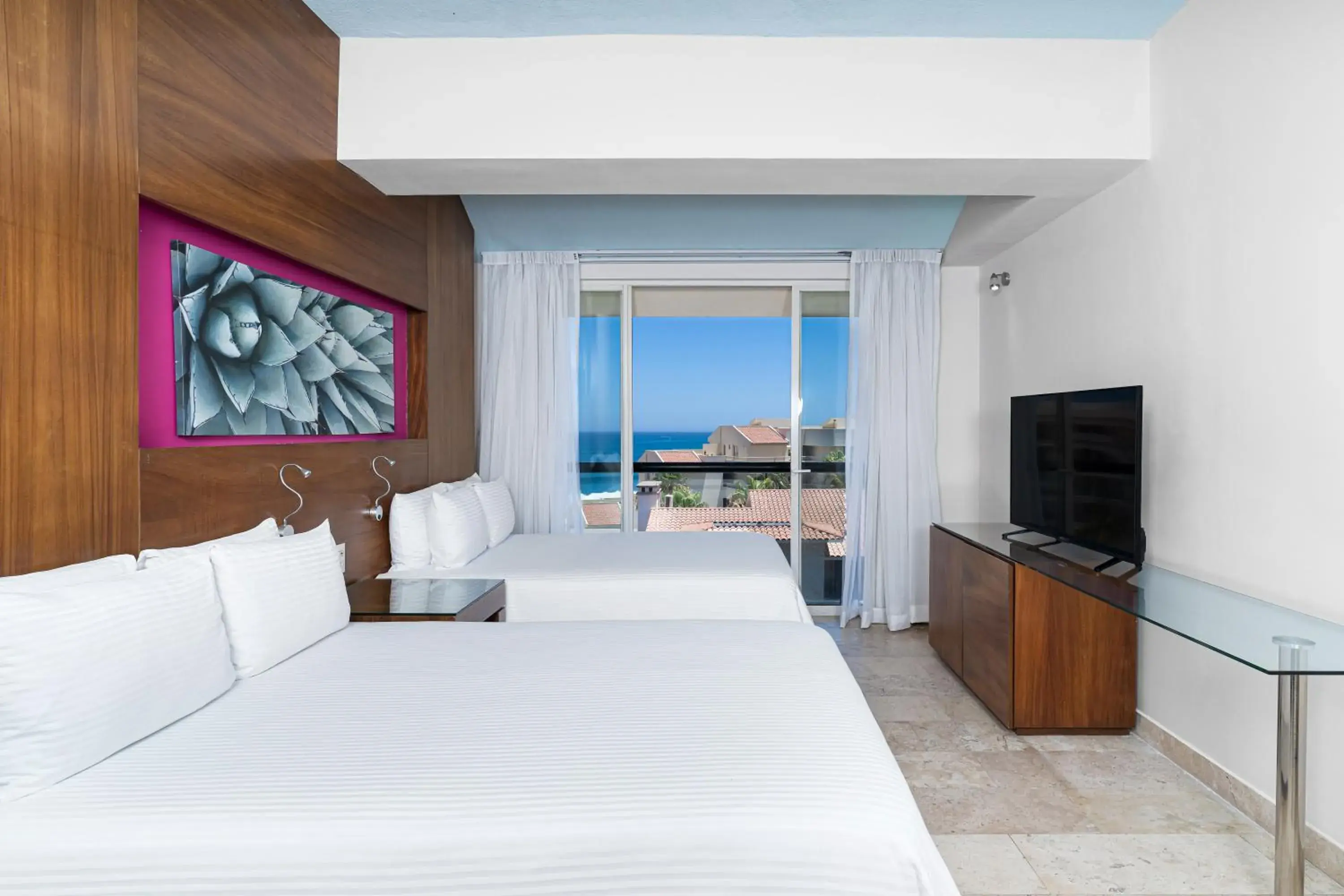 Communal lounge/ TV room, Bed in Krystal Grand Los Cabos - All Inclusive Communal lounge/ TV room, Bed in Krystal Grand Los Cabos - All Inclusive