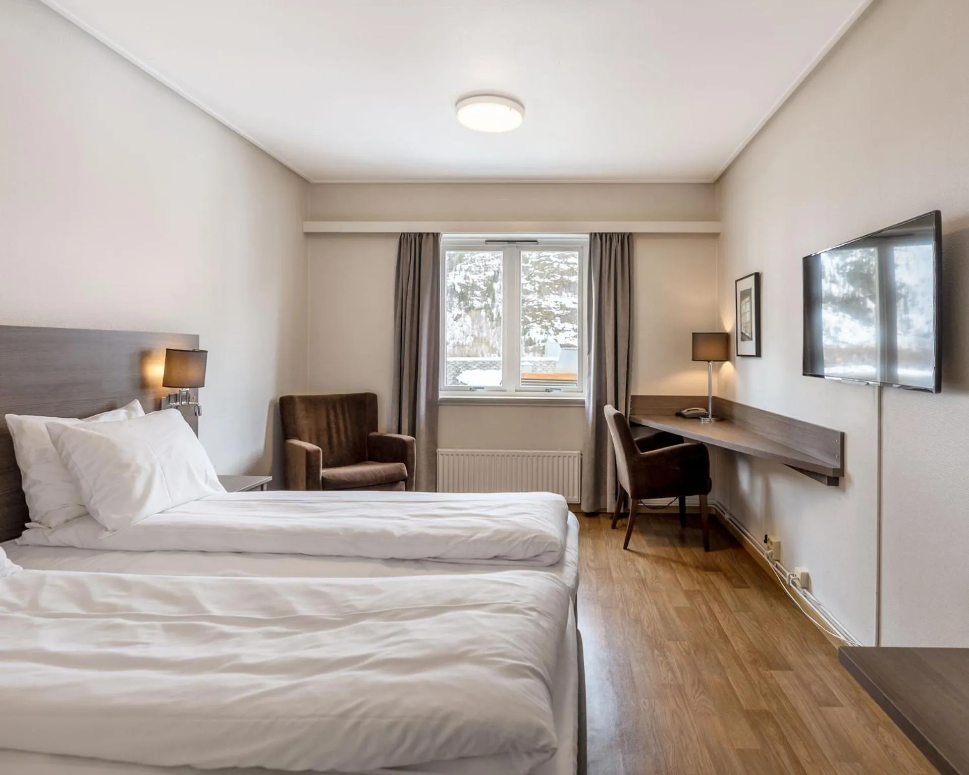 Bed in Fru Haugans Hotel