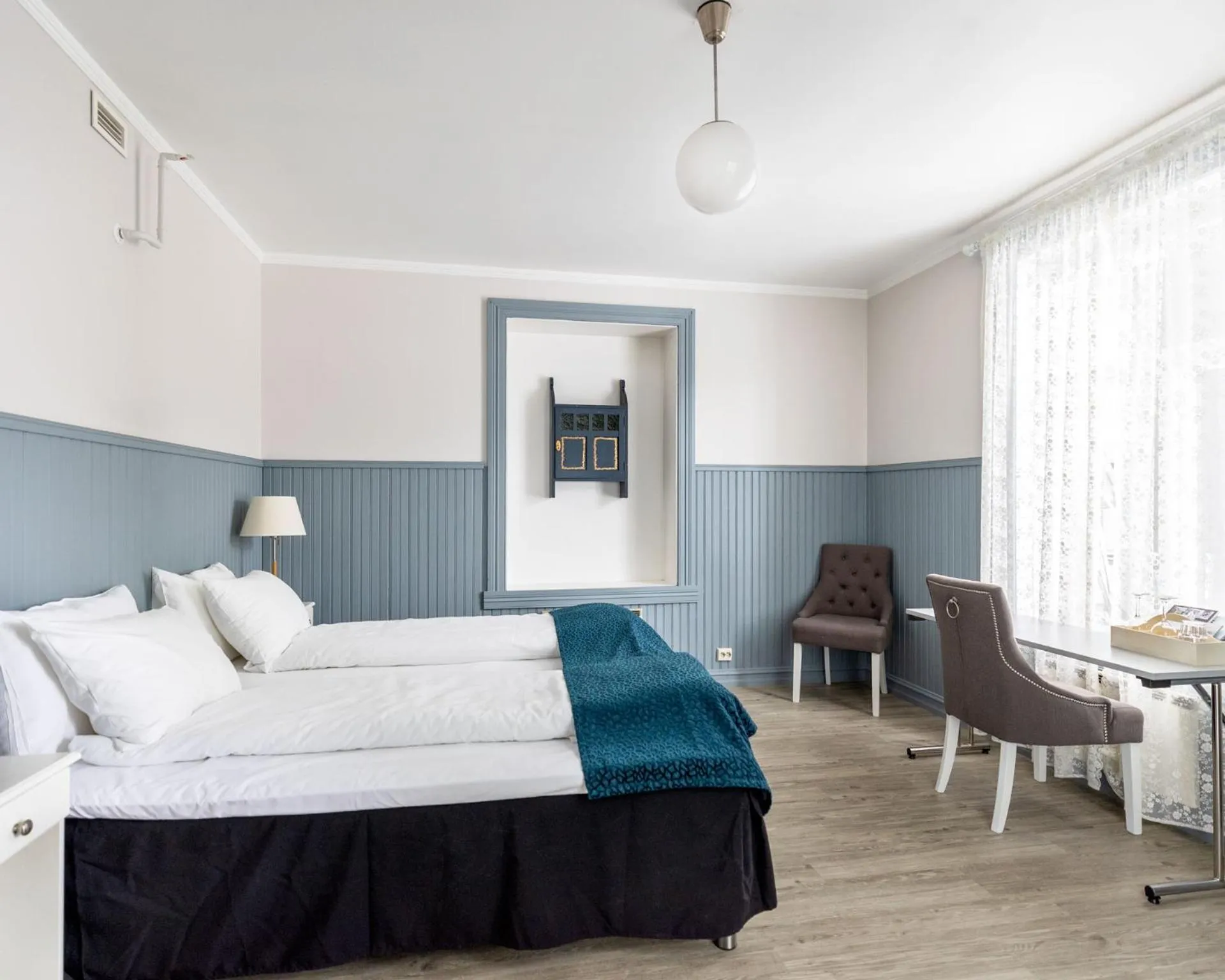 Bed in Fru Haugans Hotel