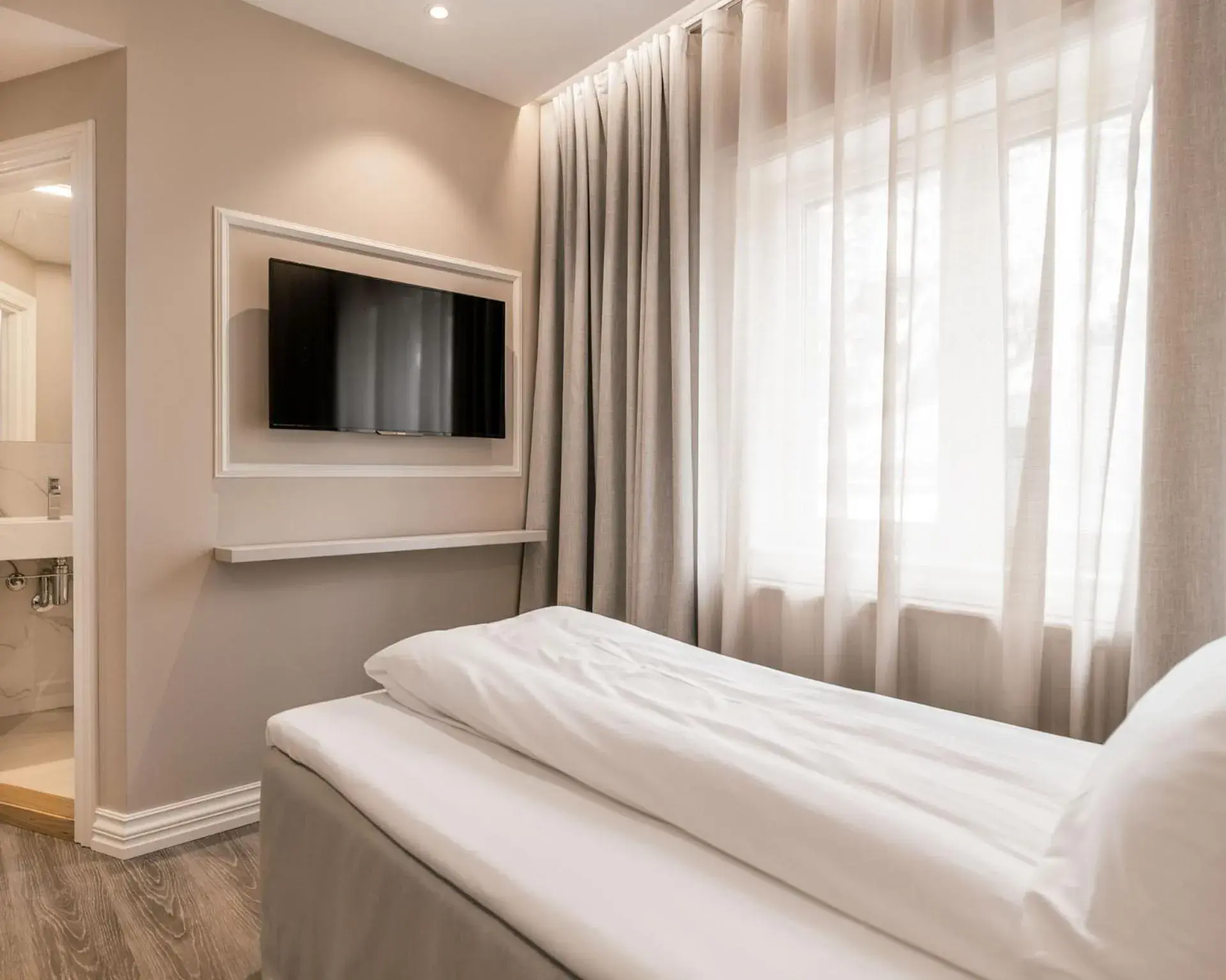 Bed in Fru Haugans Hotel Bed in Fru Haugans Hotel