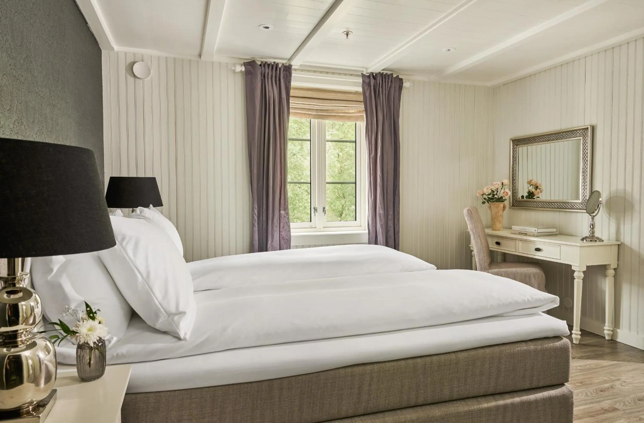 Bed in Fru Haugans Hotel