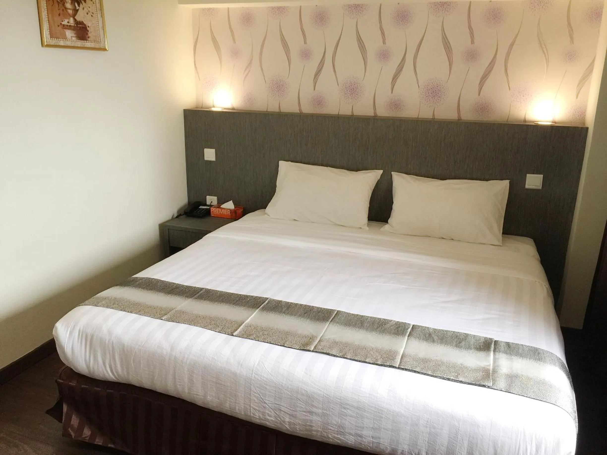 Bed in Check Inn Hotel Tawau