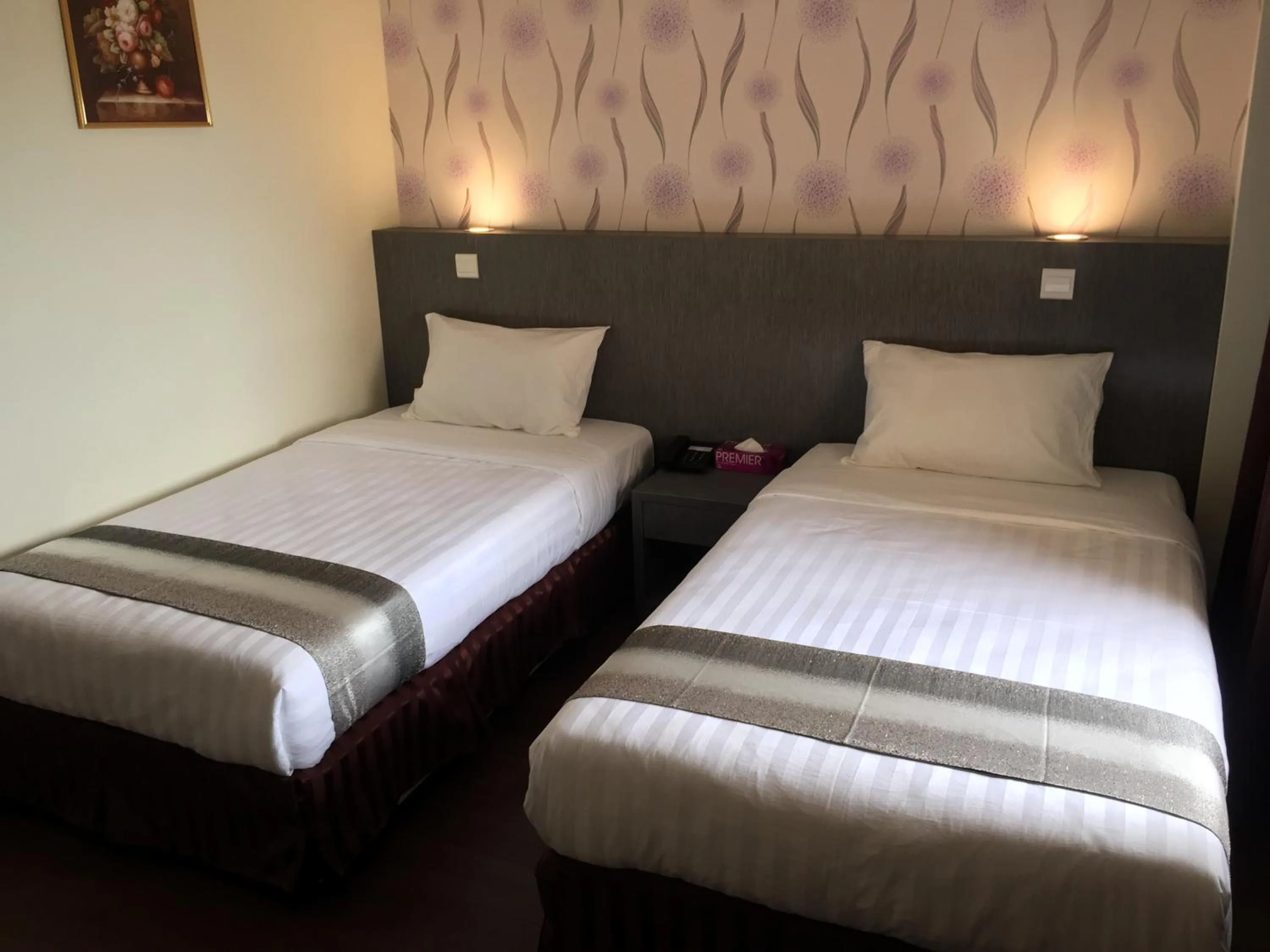 Bed in Check Inn Hotel Tawau