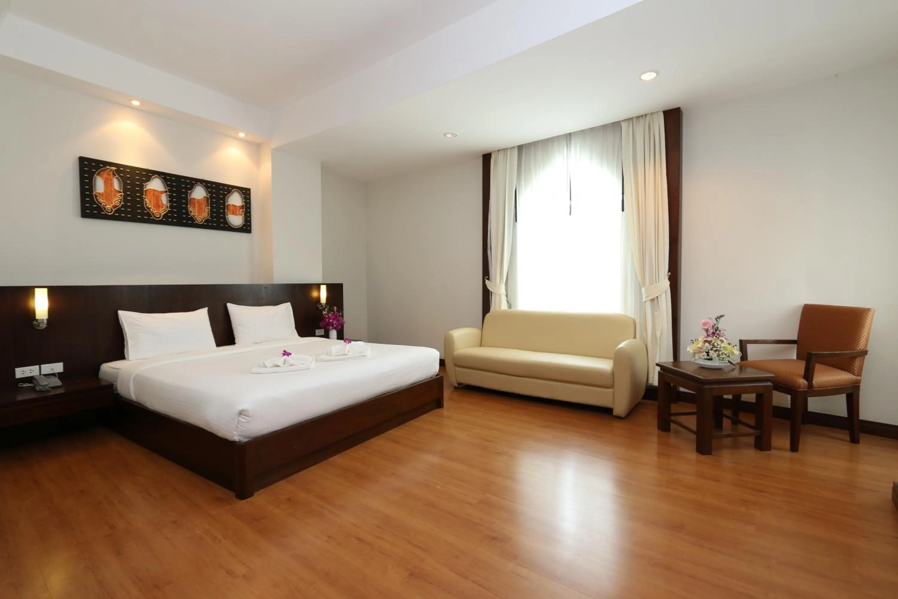 Photo of the whole room, Bed in Grande Southern Hotel