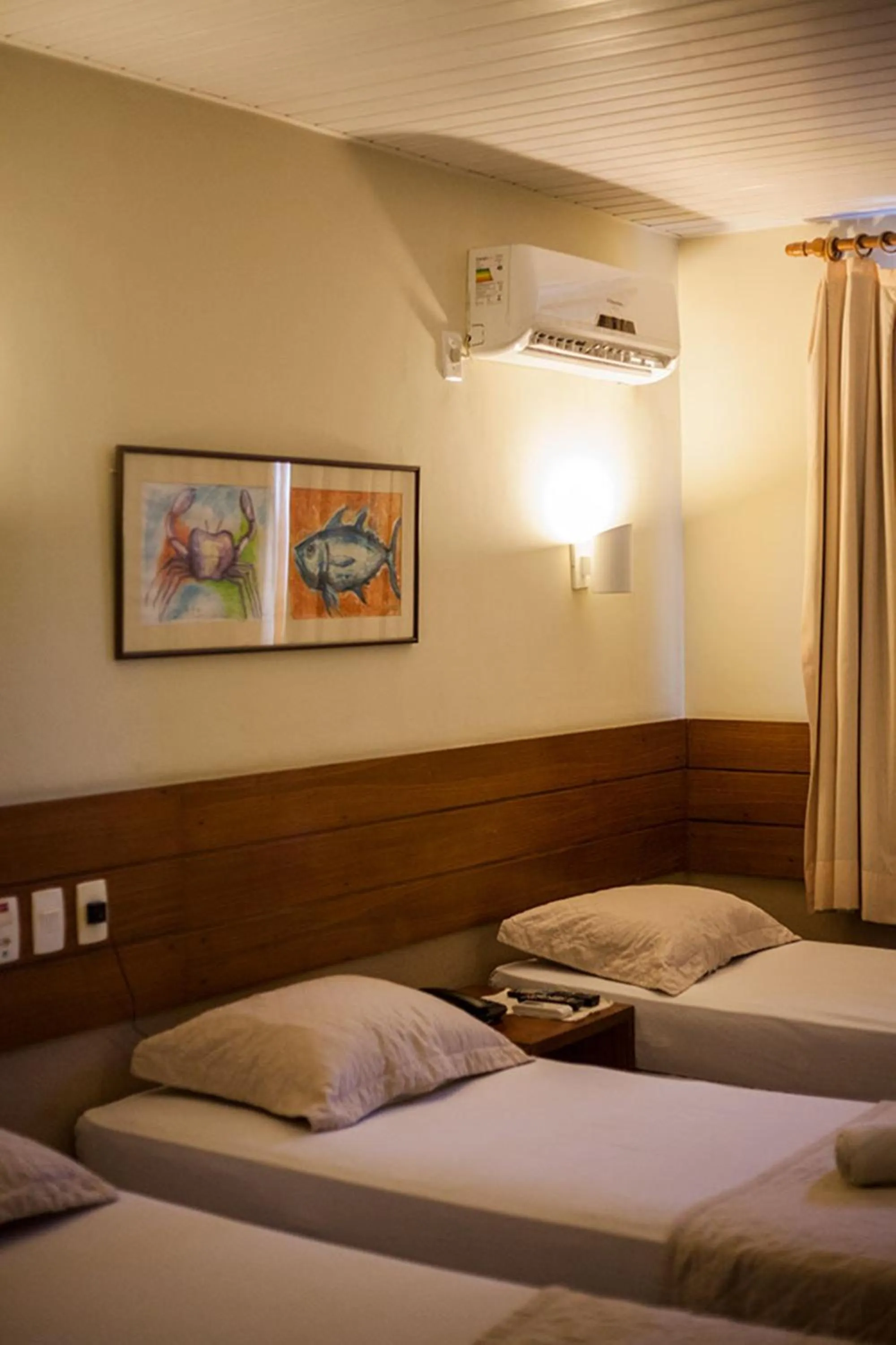 Bed in Portal Da Praia Hotel