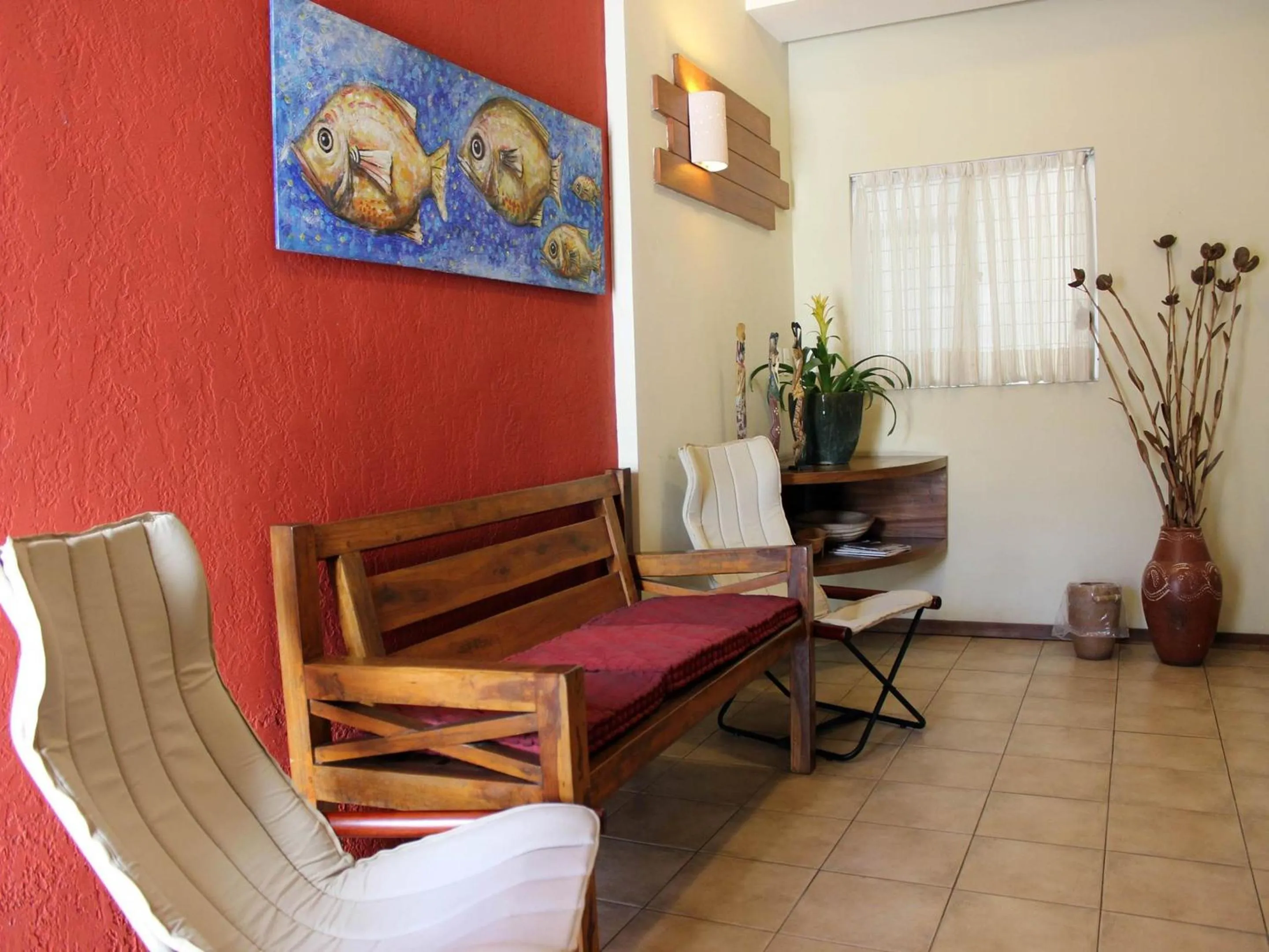 Living room in Portal Da Praia Hotel