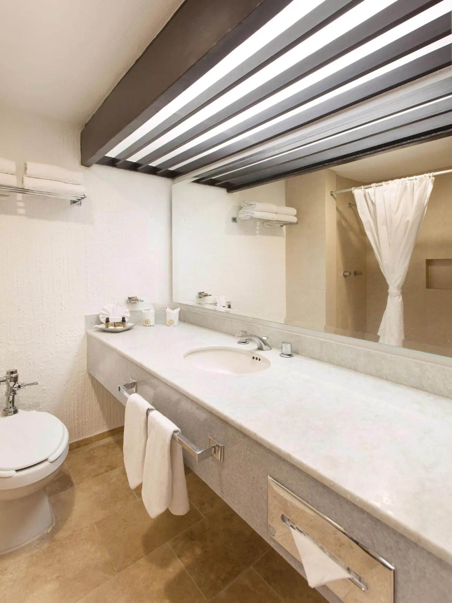 Bathroom in El Cid Granada Hotel & Country Club