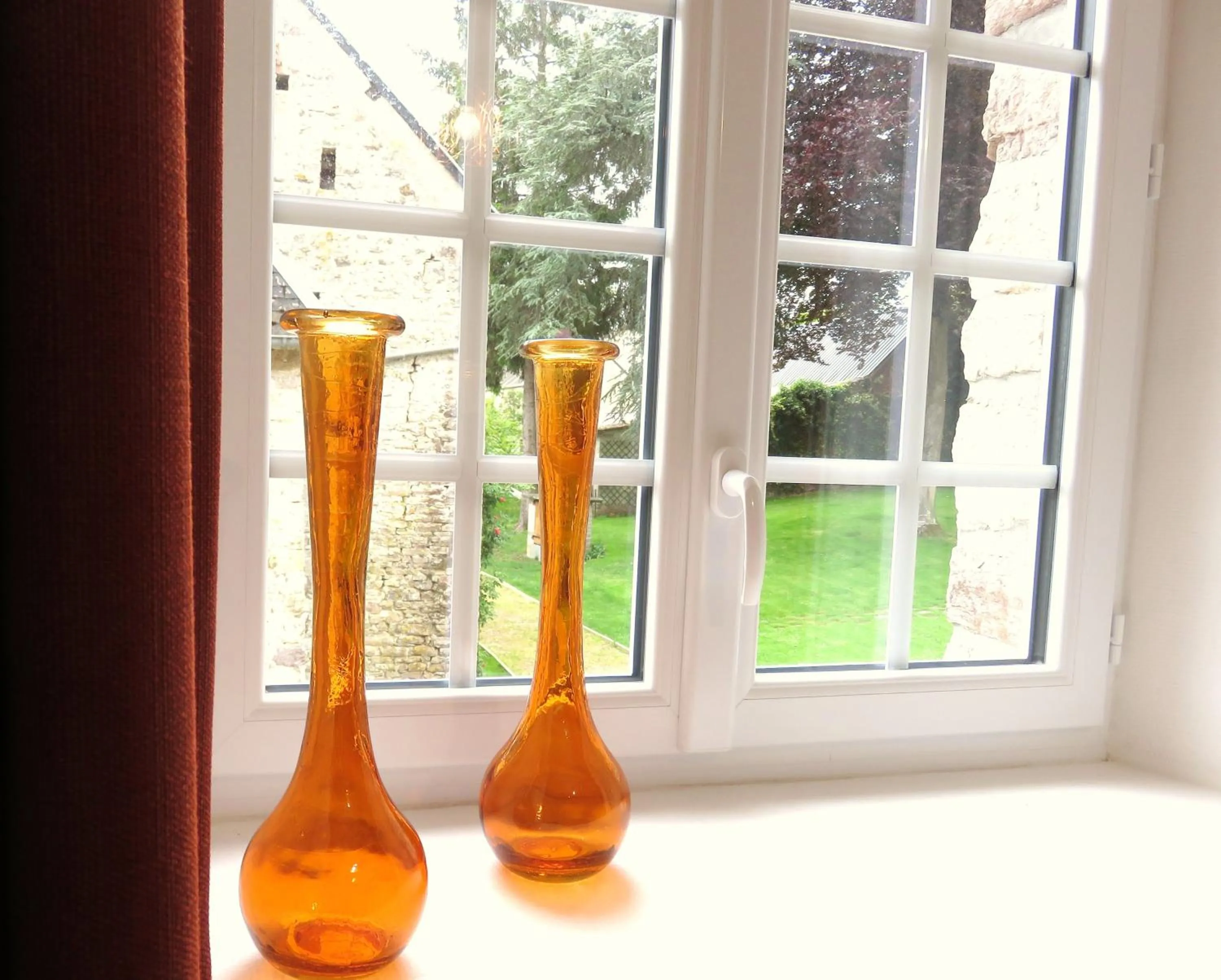 Garden view in Le Manoir de Placy - Chambres d'Hôtes