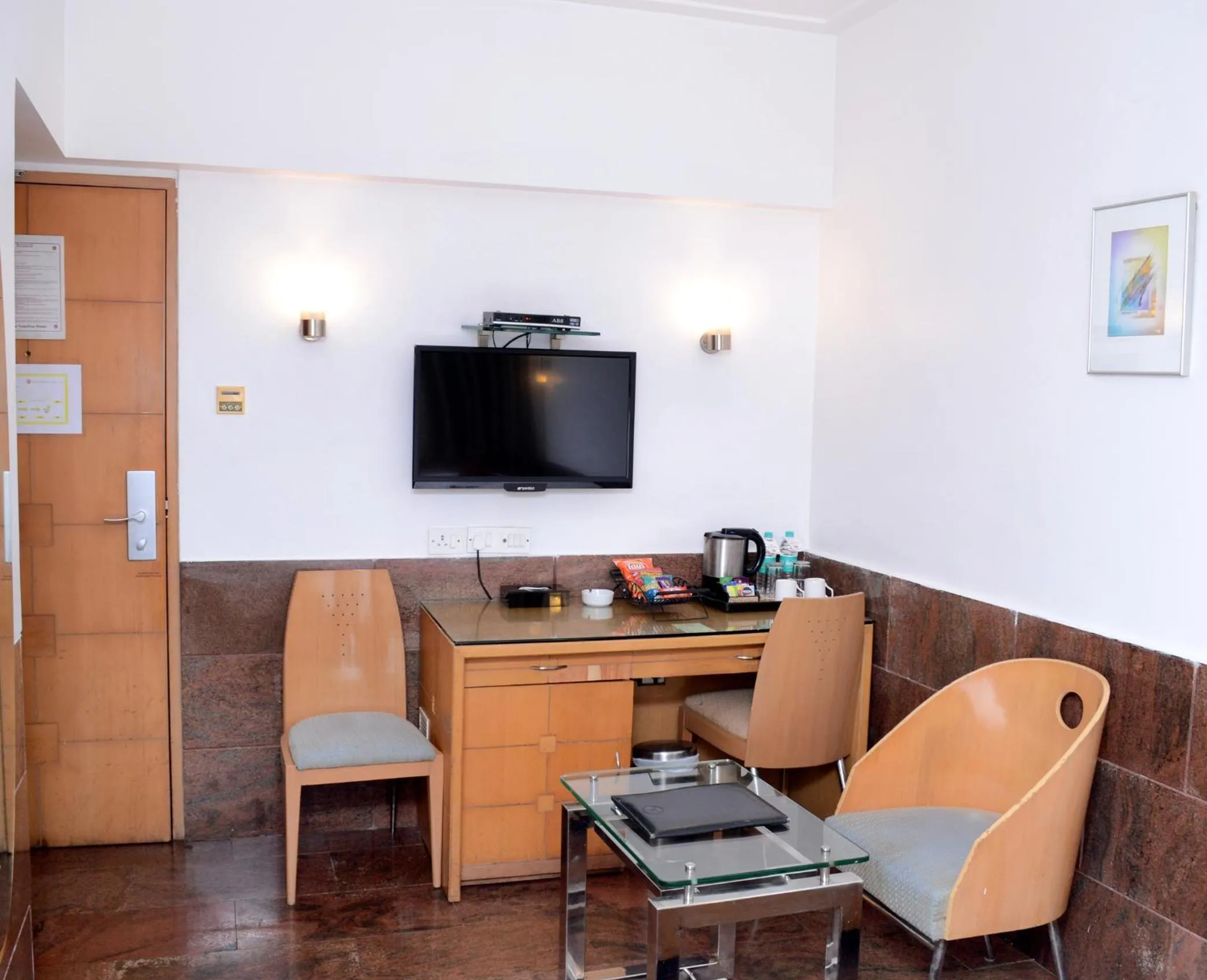 Seating area in Ramee Guestline Hotel Khar