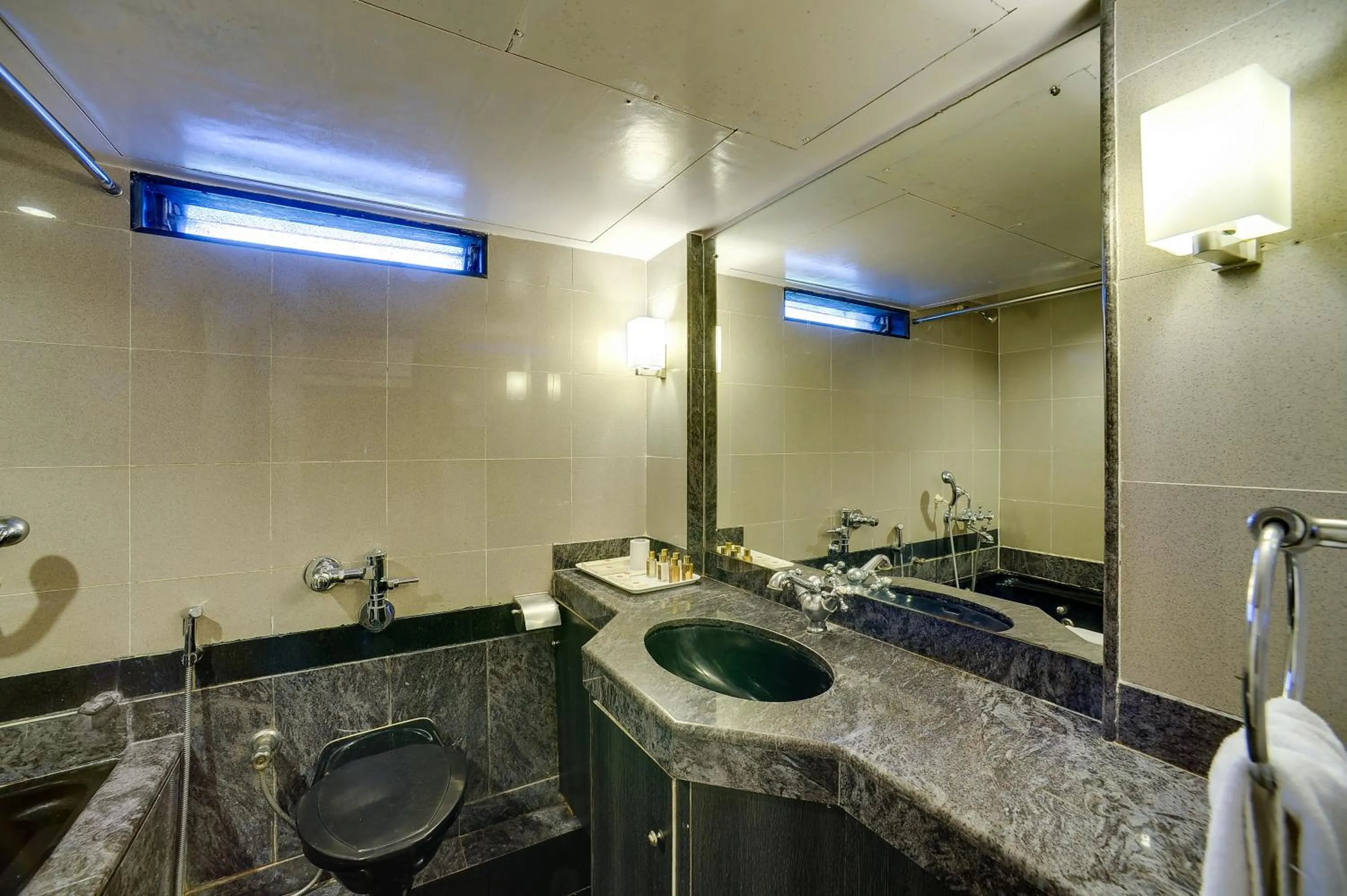 Bathroom in Ramee Guestline Hotel Khar