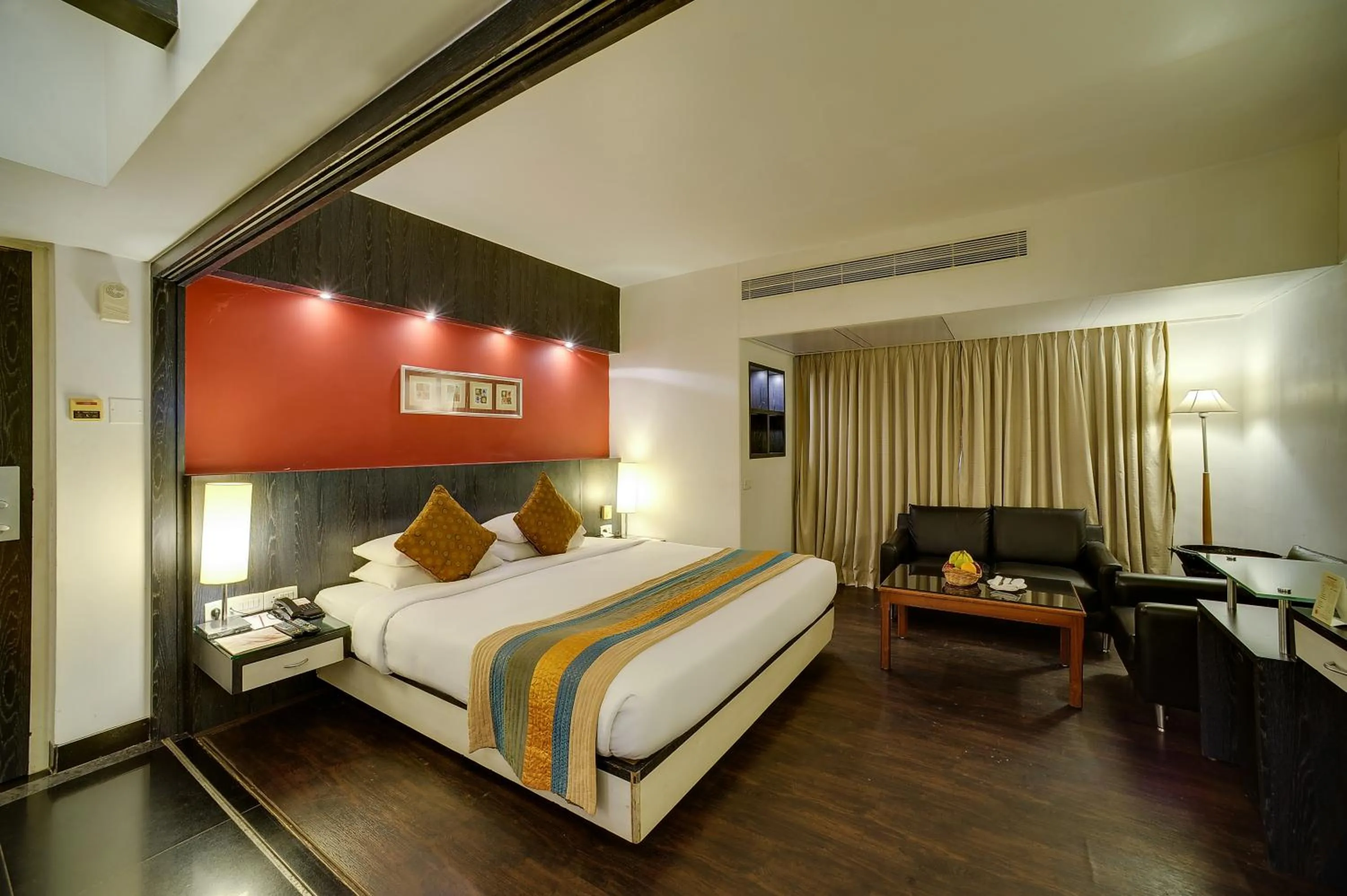 Photo of the whole room, Bed in Ramee Guestline Hotel Khar