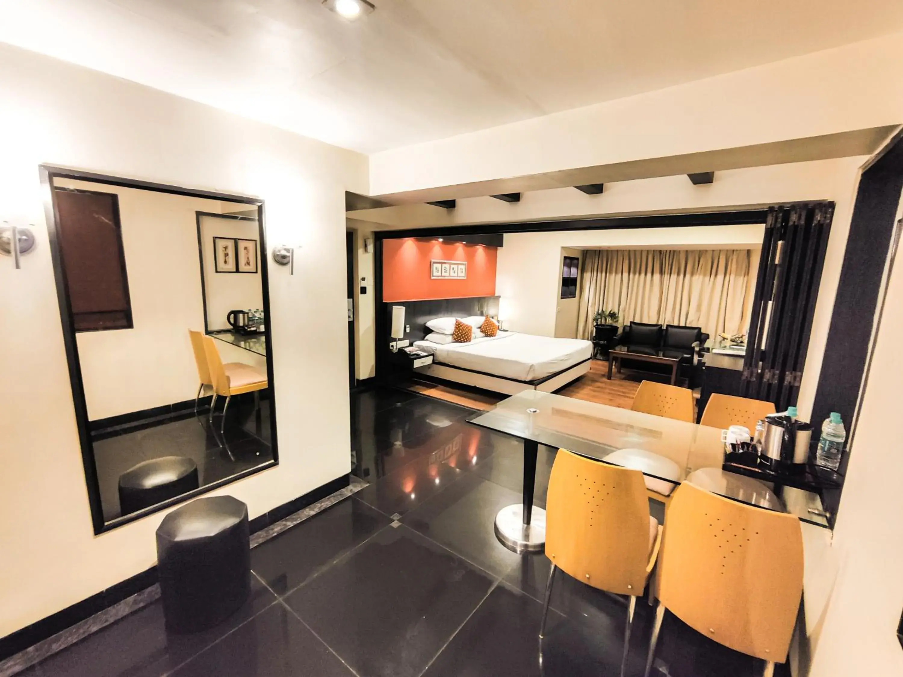 Seating area, Bed in Ramee Guestline Hotel Khar Seating area, Bed in Ramee Guestline Hotel Khar