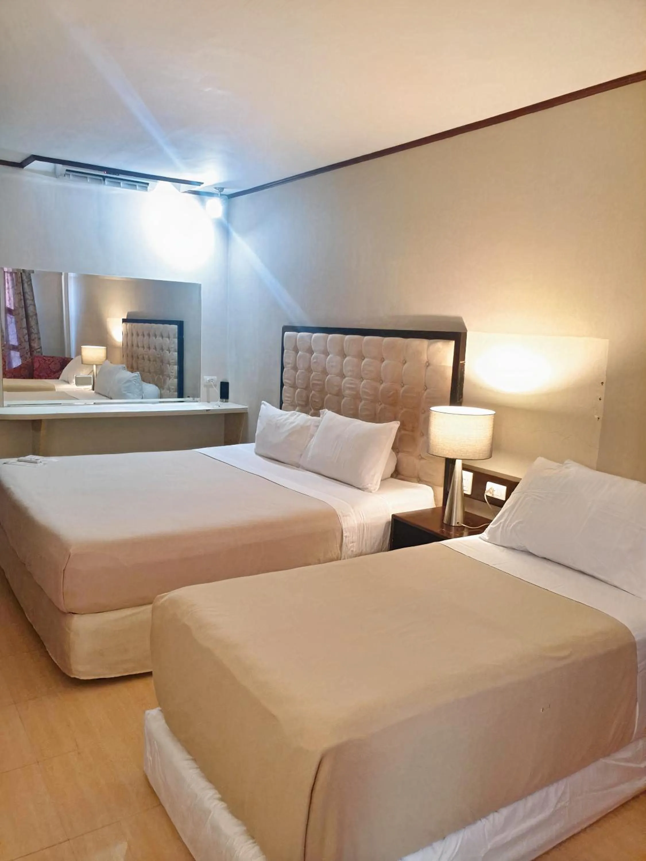 Bed in Cebu Dulcinea Hotel and Suites-MACTAN AIRPORT HOTEL