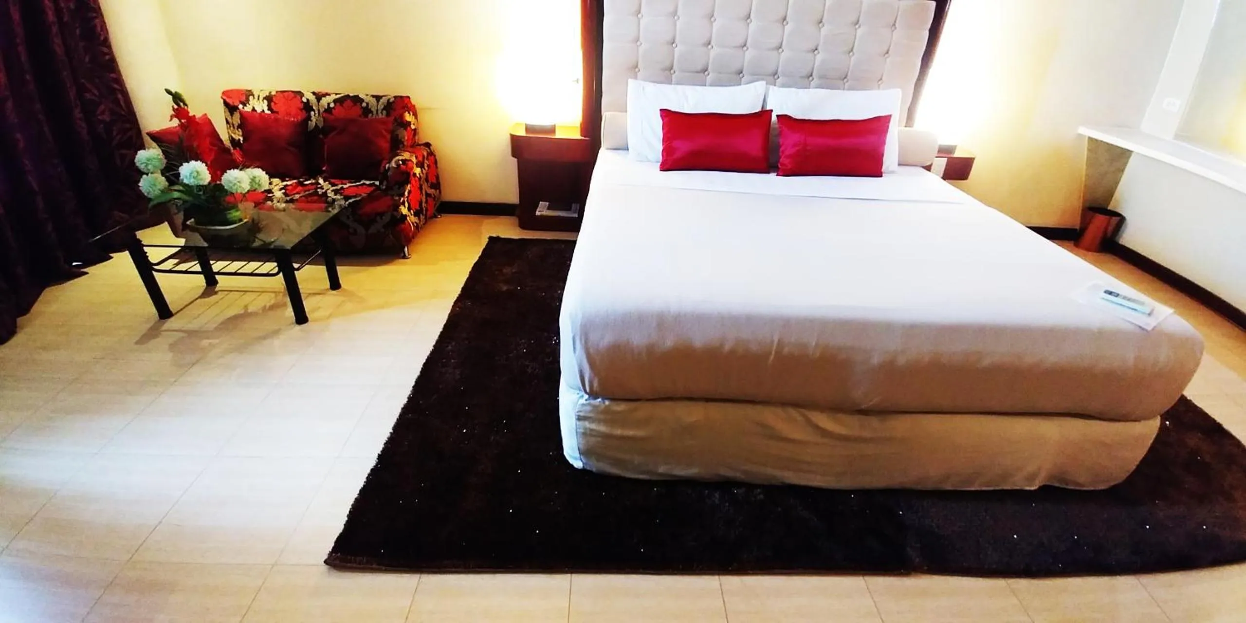 Bed in Cebu Dulcinea Hotel and Suites-MACTAN AIRPORT HOTEL